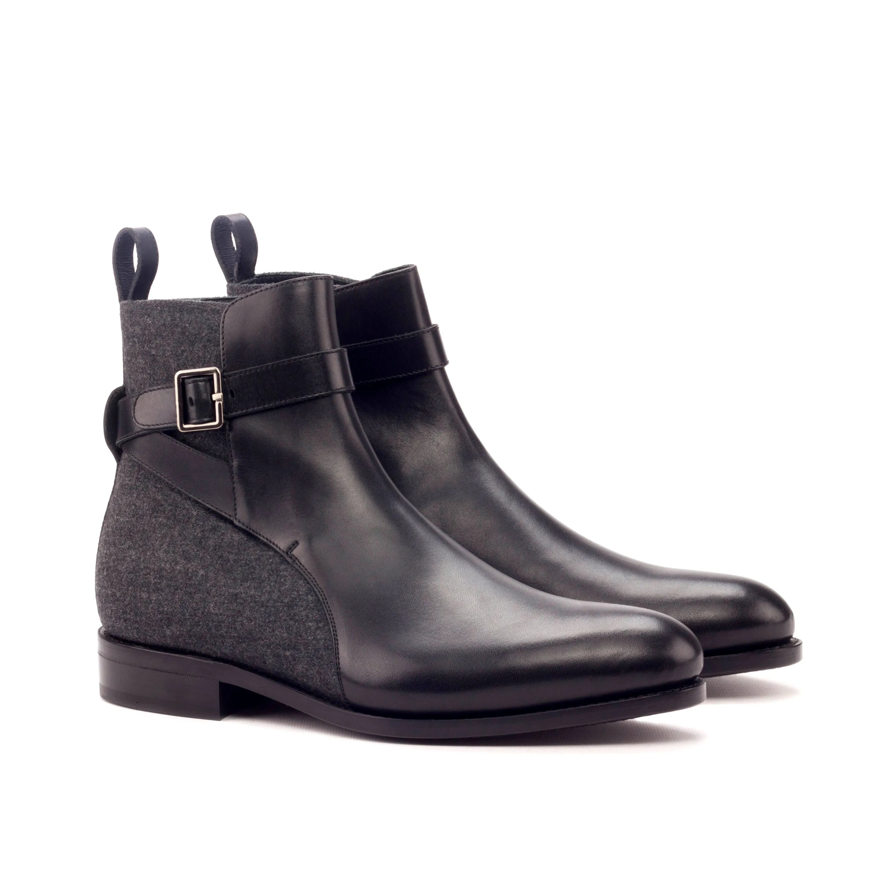 Pair of black leather Singapor Jodhpur Boots featuring a stylish buckle design