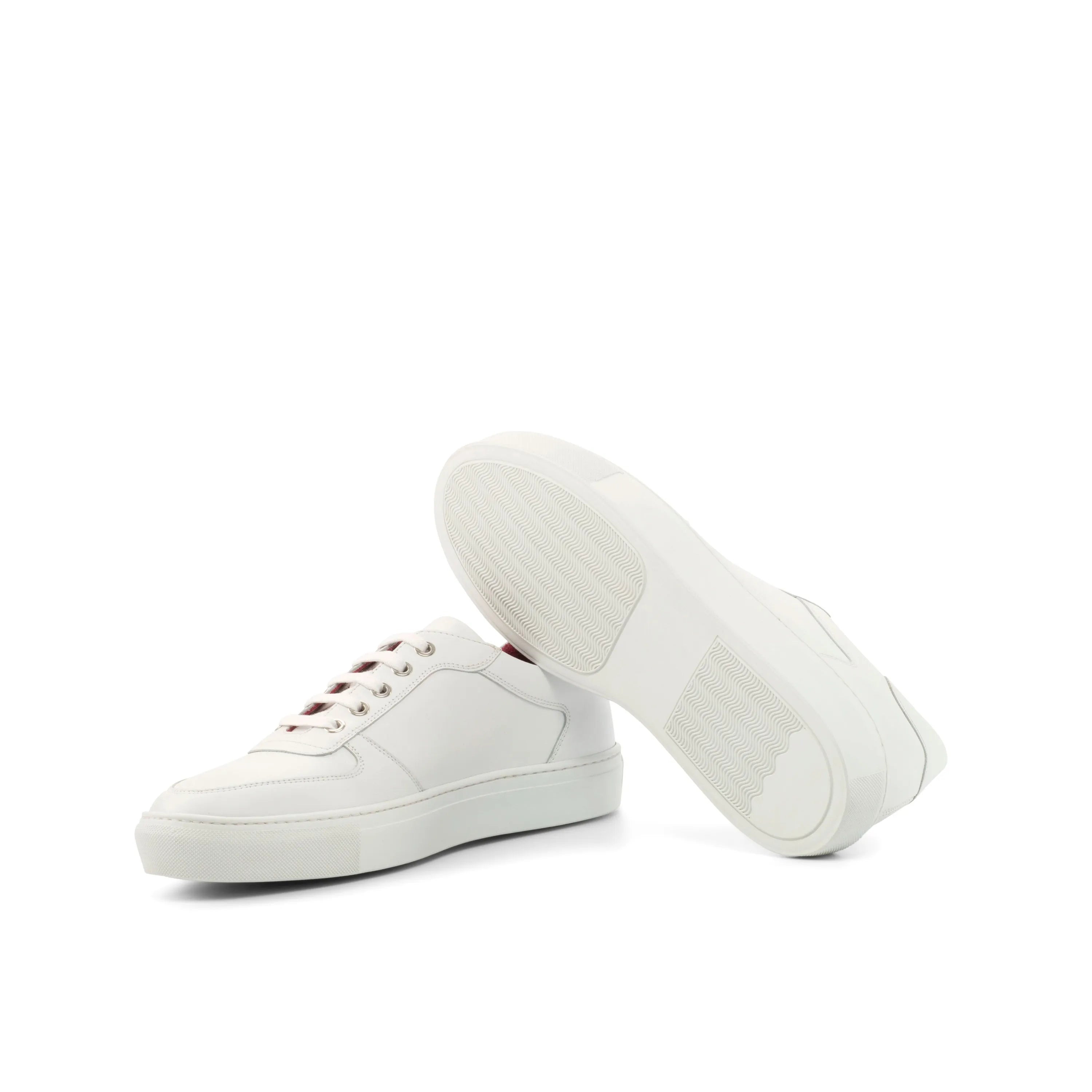 Pair of white leather Snow Trainer Sneakers perfect for stylish winter wear