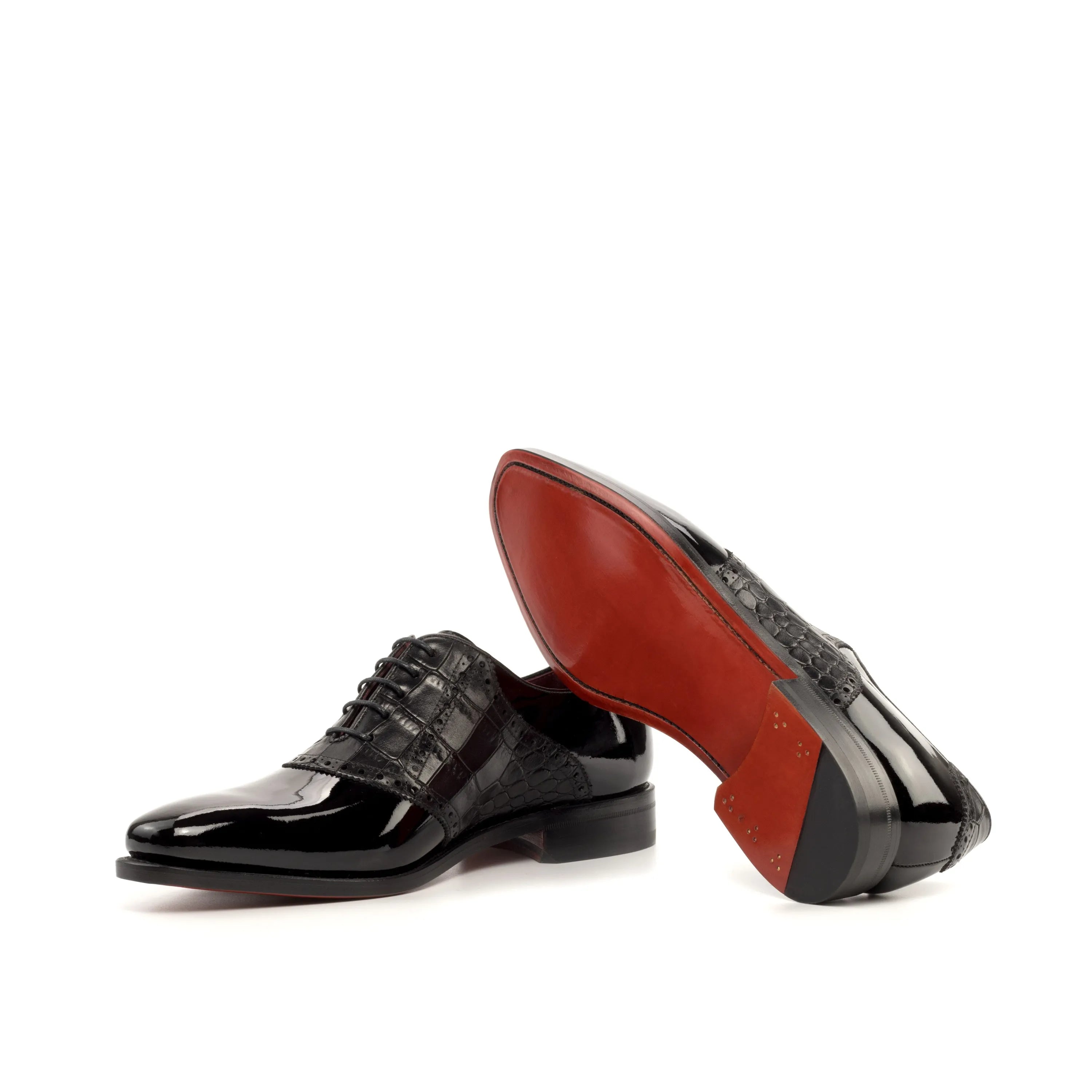 Pair of Sorgino Saddle Shoes II in black leather with striking red soles