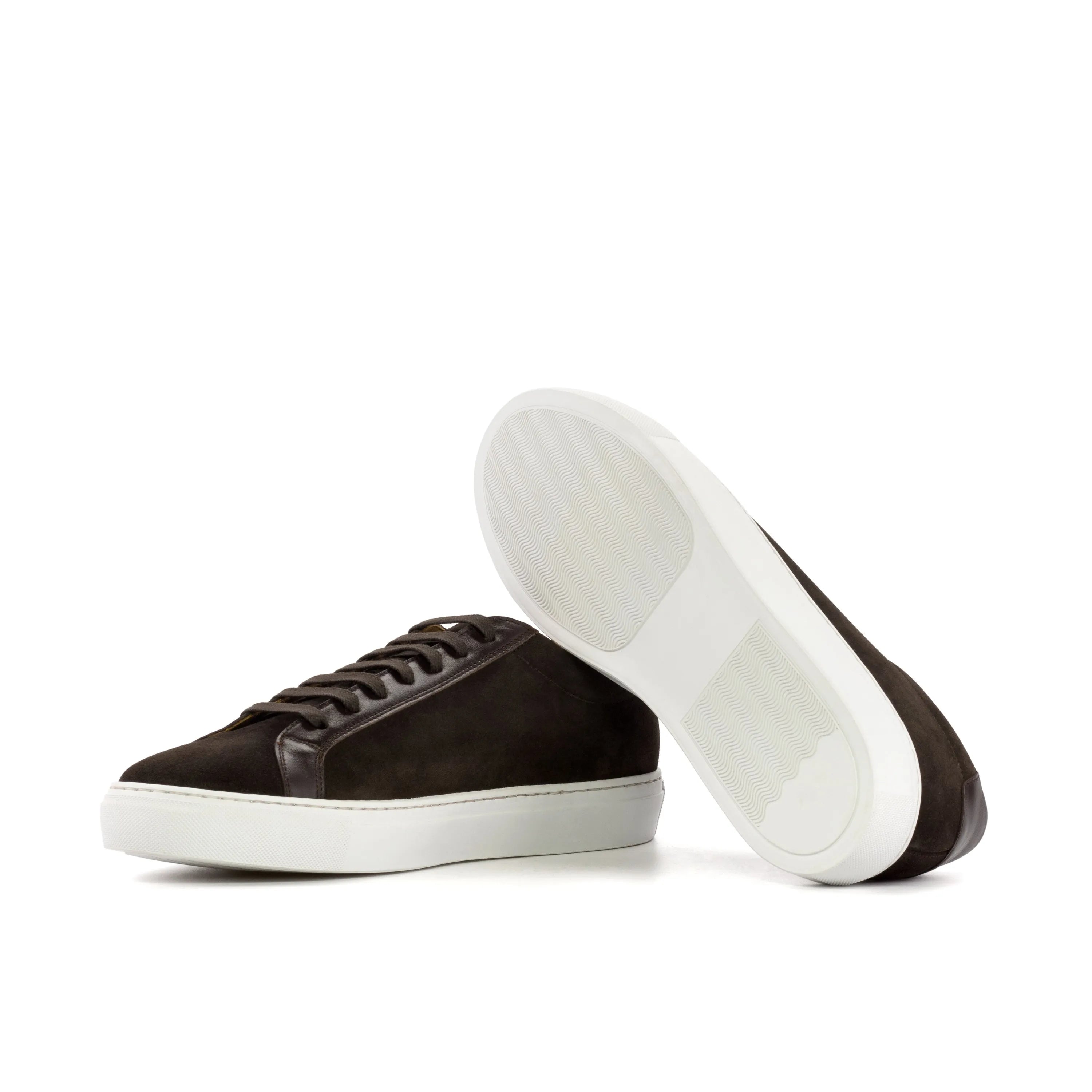 Brown suede Sterling Low Kick sneakers with stylish white soles for casual wear