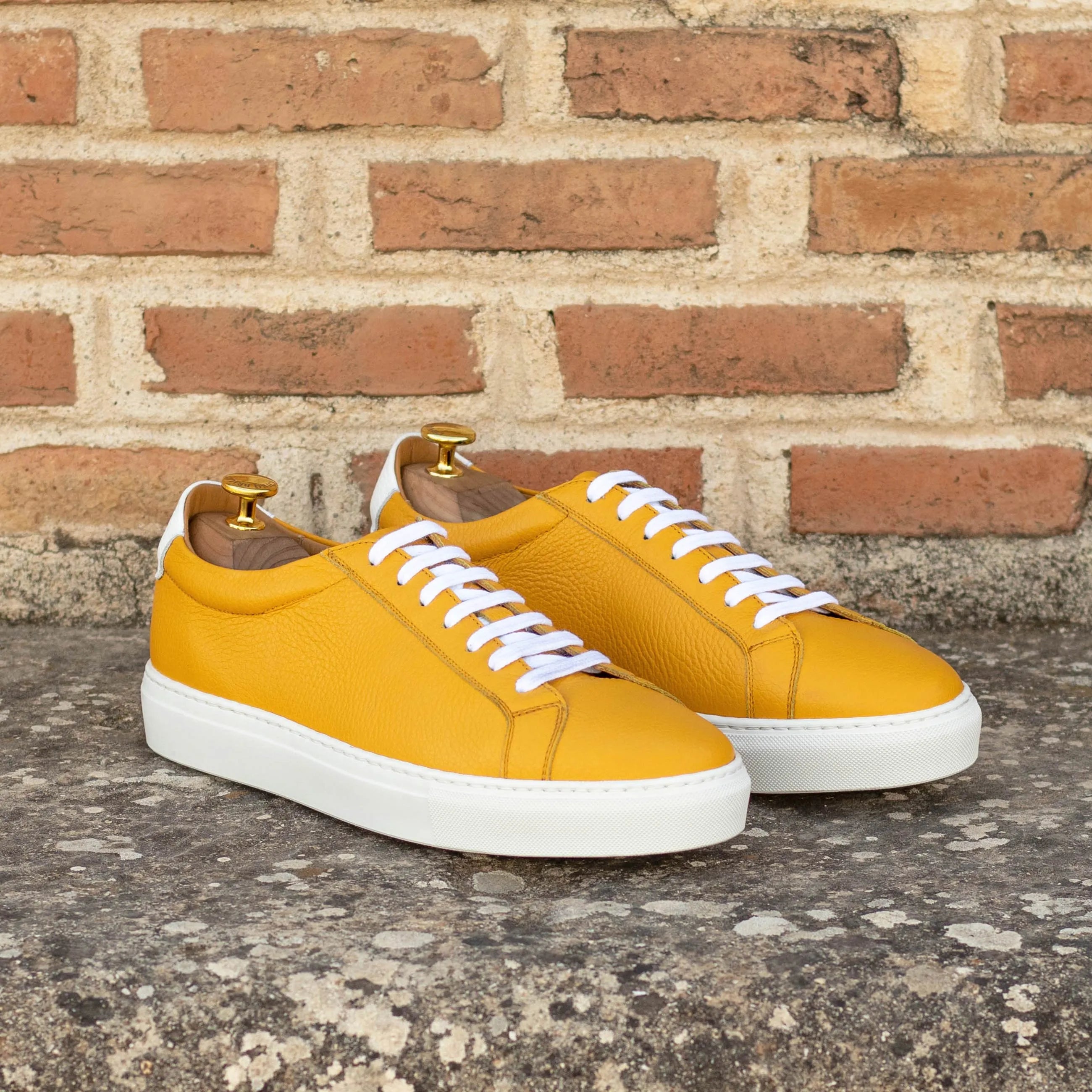Yellow grain calf leather Sunnies low kick sneakers showcasing stylish design
