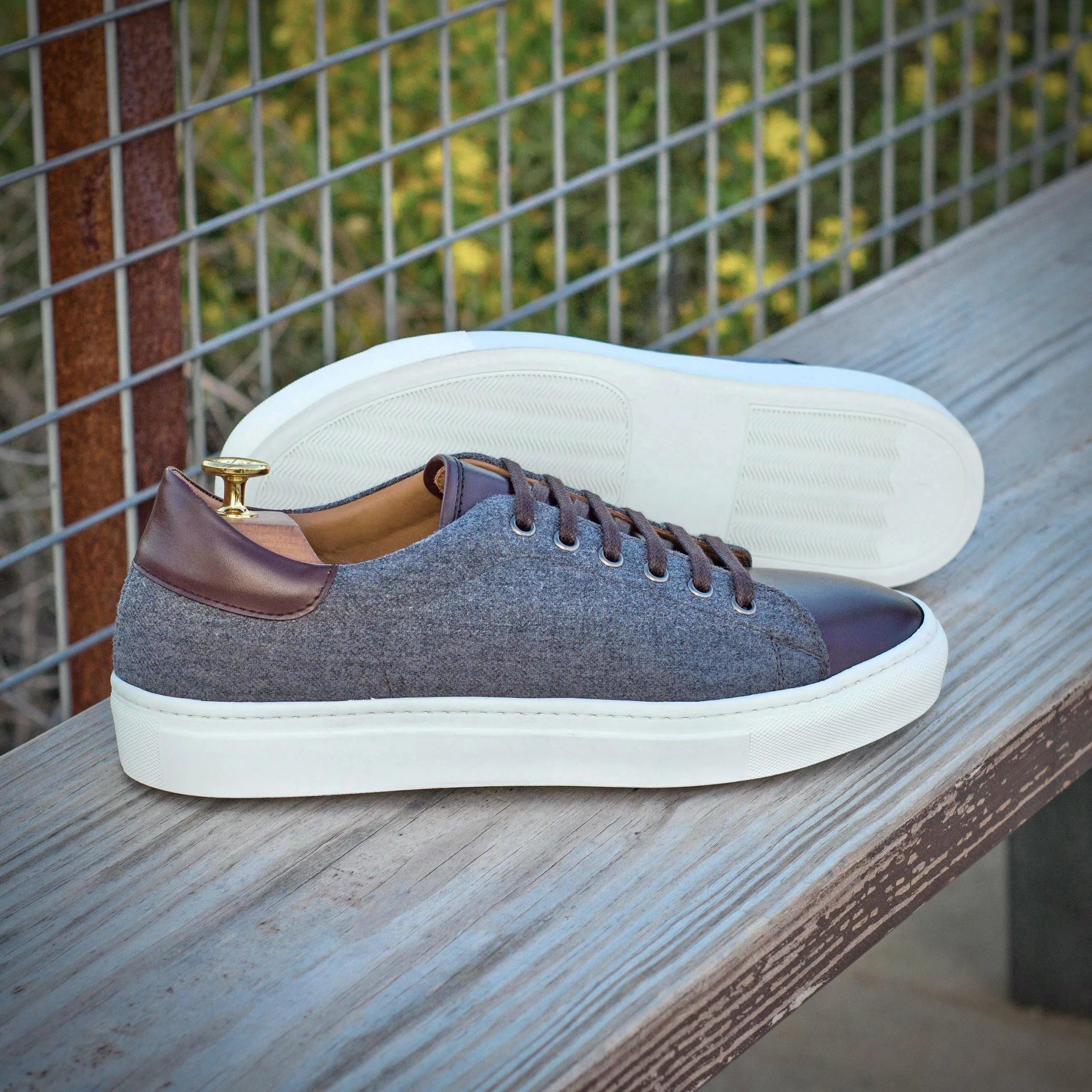 Stylish gray and brown leather Supera Trainer Sneakers with a cupsole design