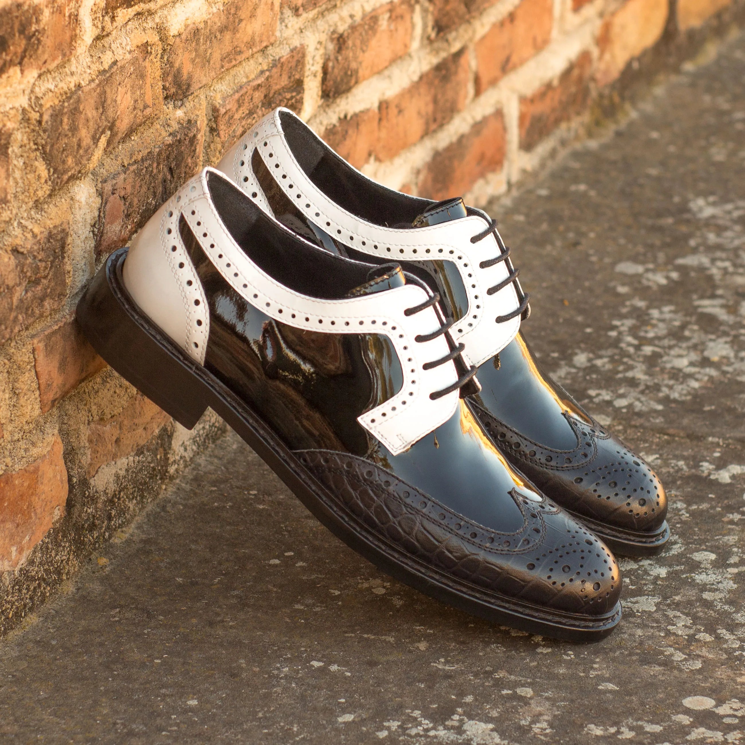 Black and white Tamina Ladies Derby Wingtip dress shoes featuring classic wingtip design