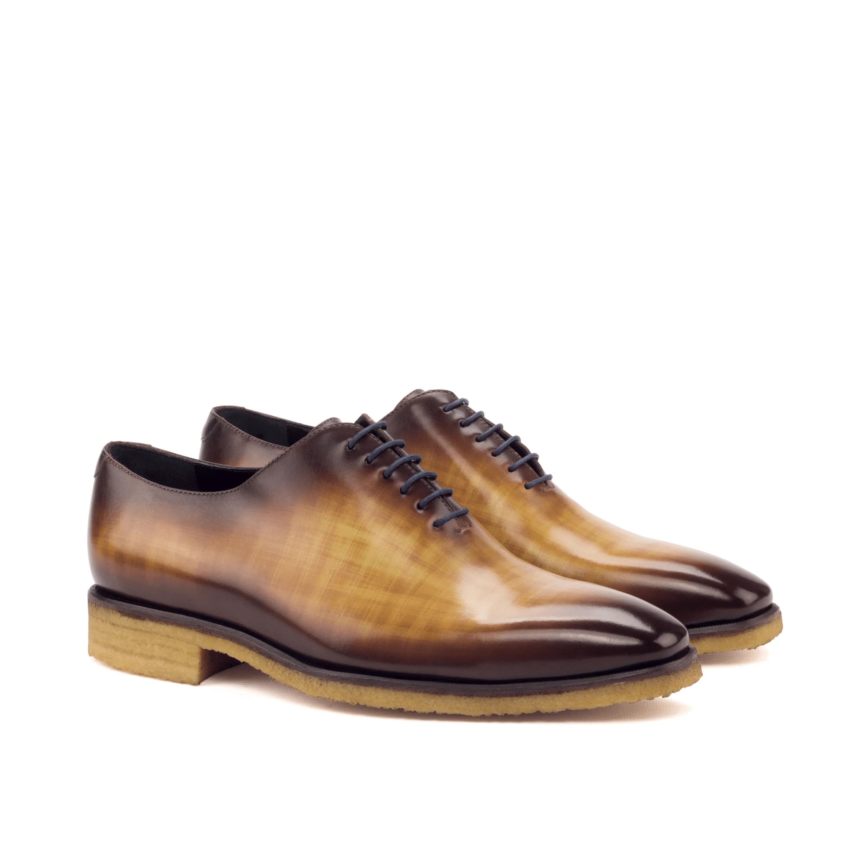 Brown leather dress shoes, Tesla Wholecut Patina II, showcasing elegant wholecut design