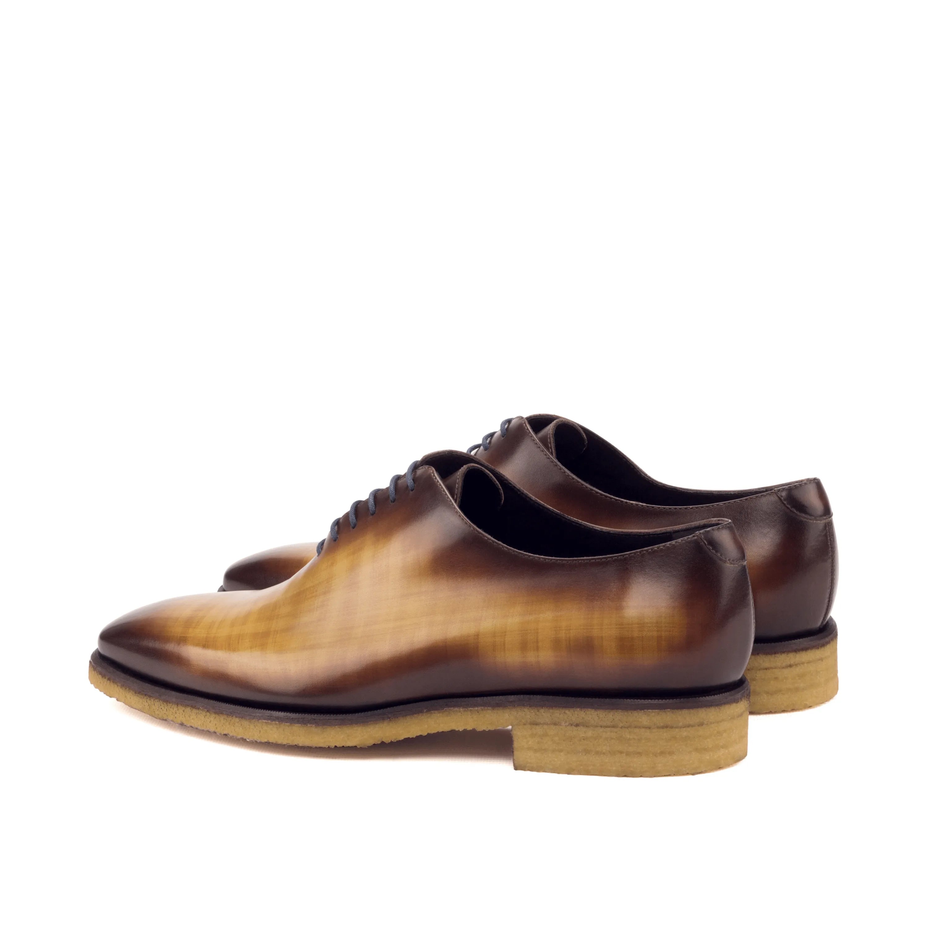Brown leather dress shoes, Tesla Wholecut Patina II, showcasing elegant wholecut design