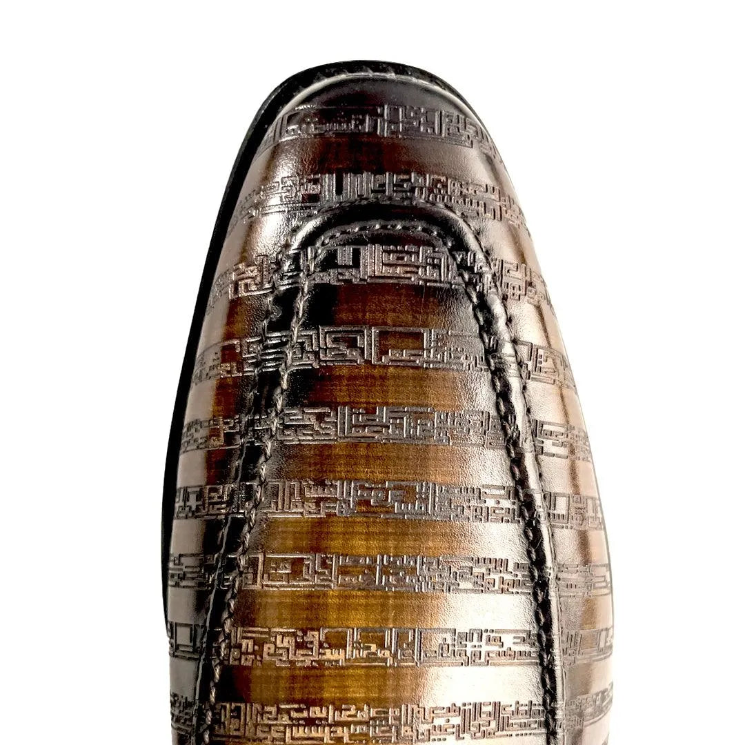 Patterned brown leather shoe from The Poet VIII Patina loafers, featuring a leather art sole