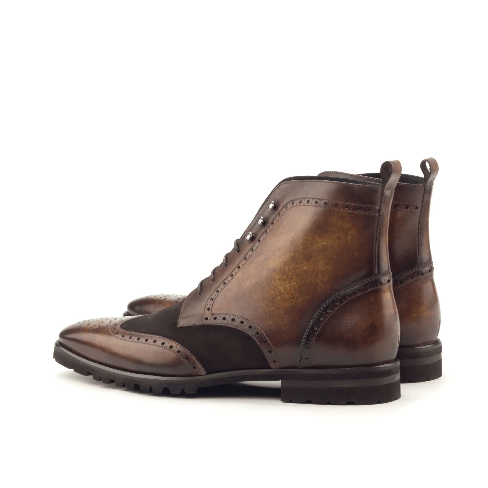 Brown leather and suede wingtip boots, the Theron Military Brogue stylishly exemplify patina shoes