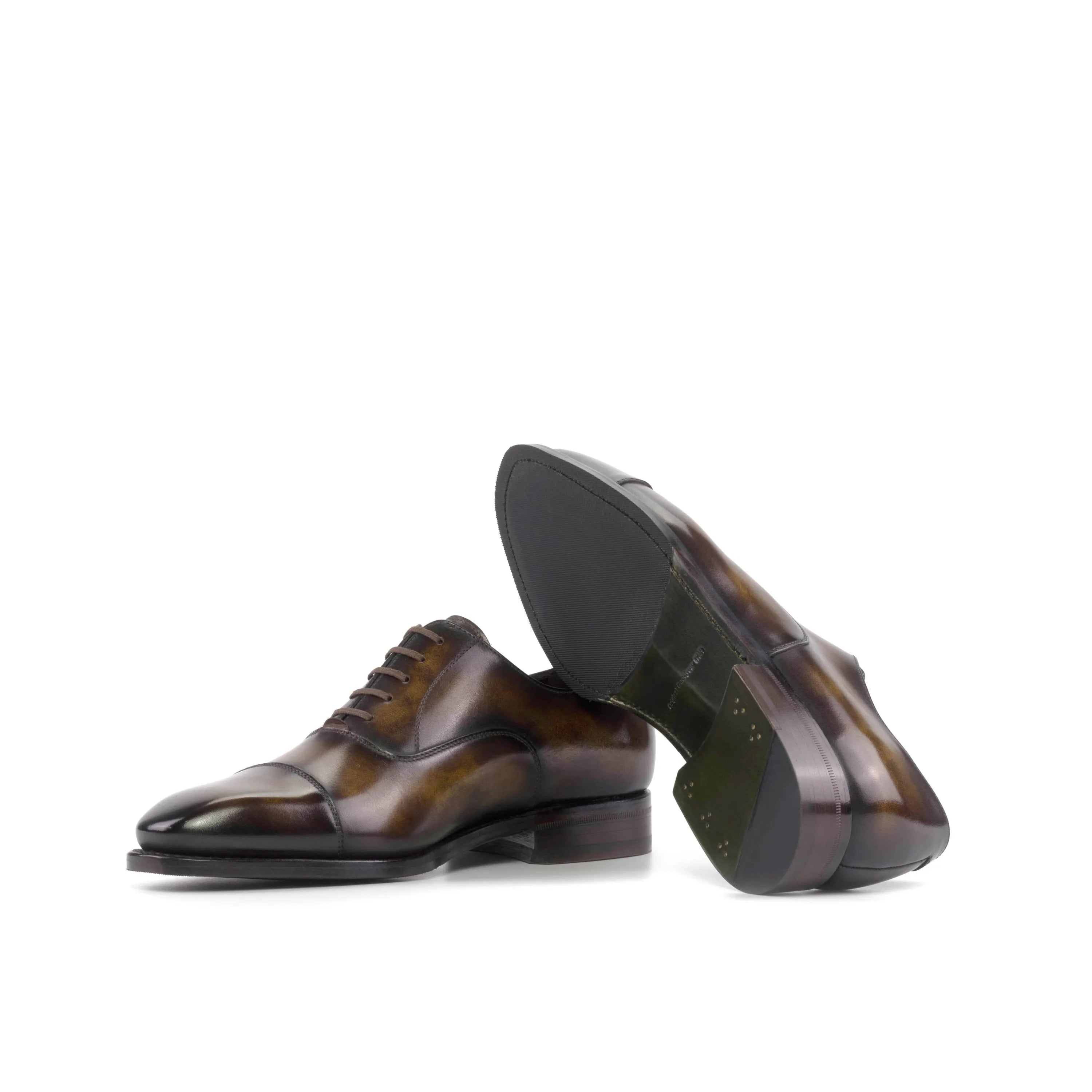 Pair of Thundro Patina Oxford shoes in brown leather for a refined look in the fast lane