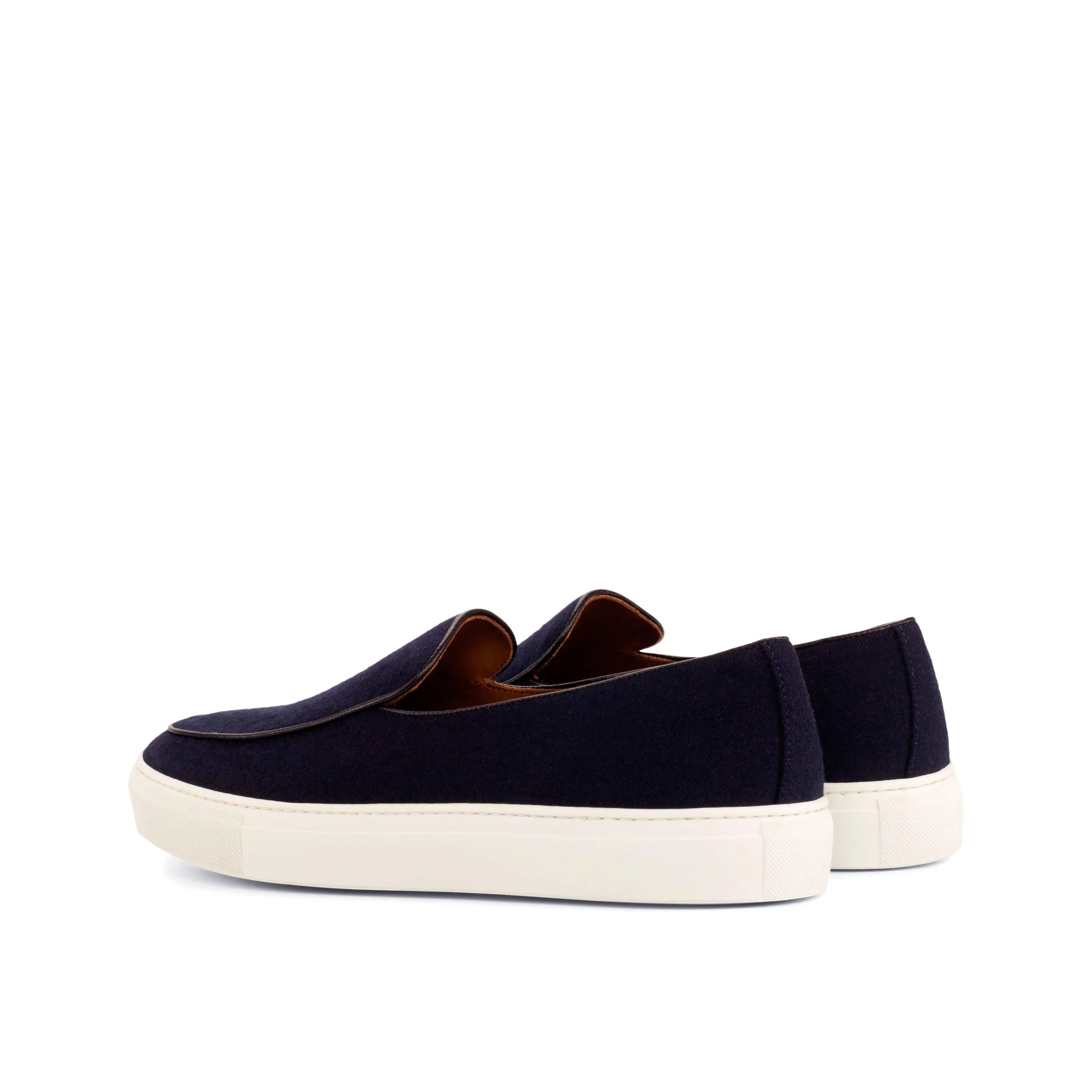 Navy blue slip-on shoes, featuring the Tommy90 Belgian Monk Sneaker II design