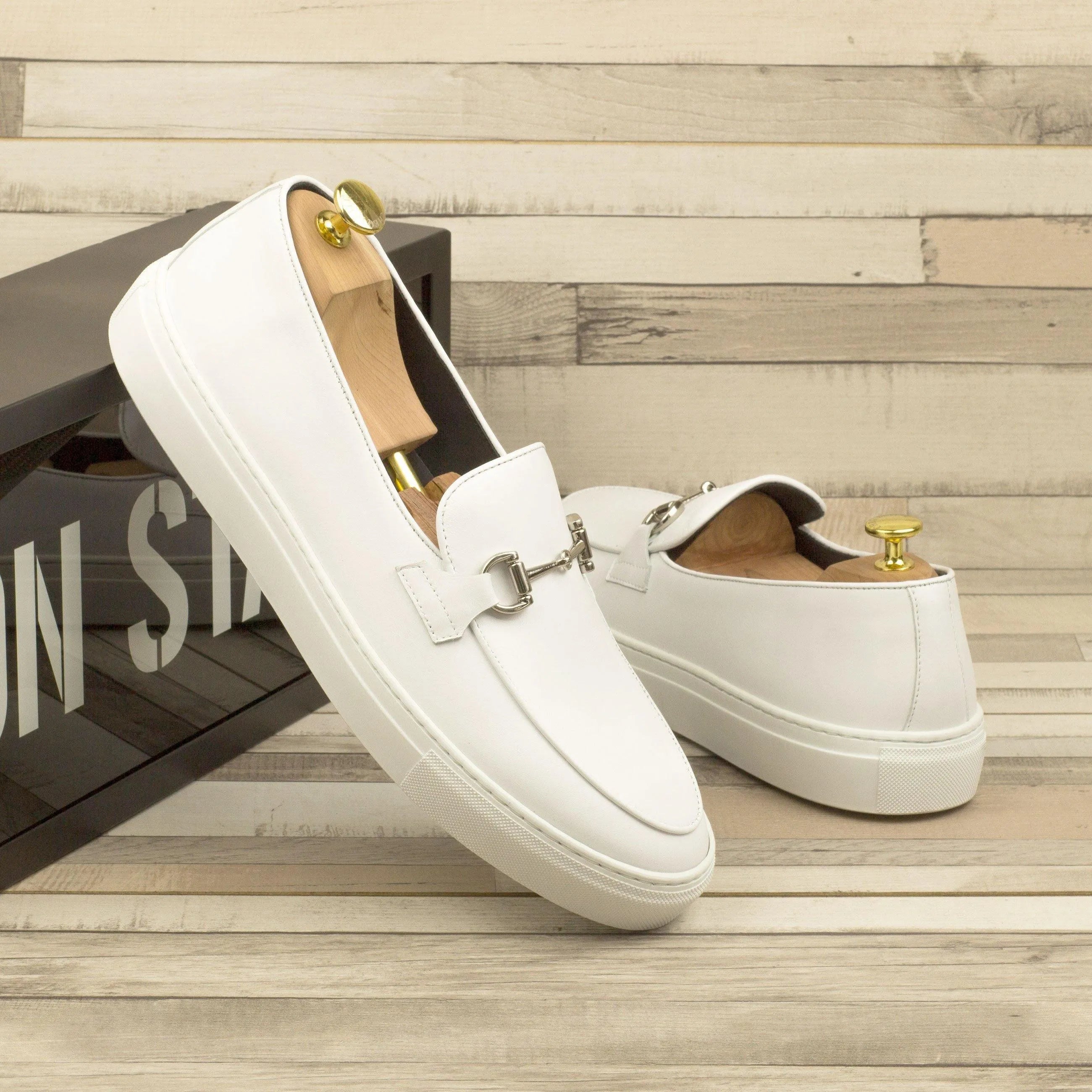 Pair of white leather loafers from the Tony Belgian Sneaker II collection