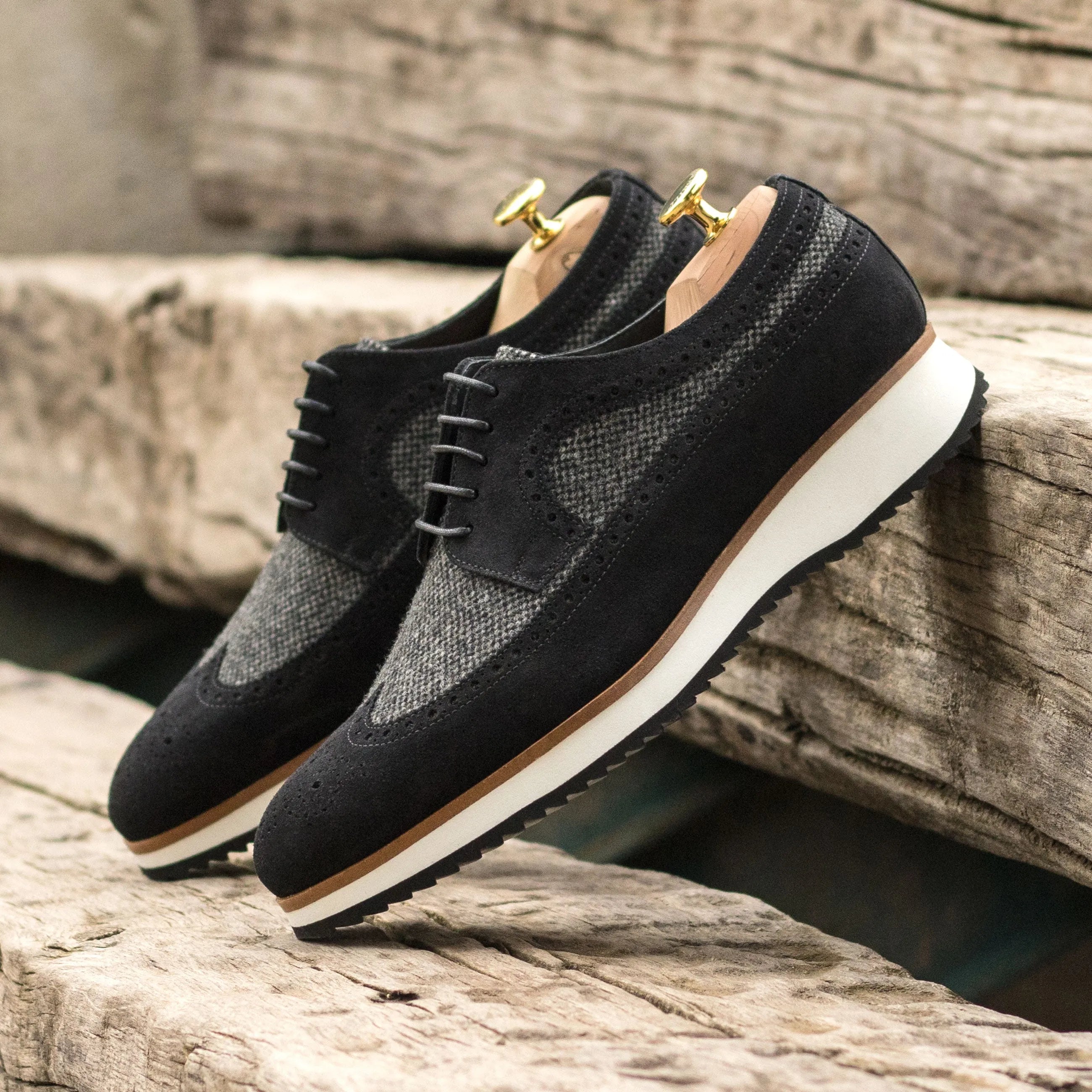 Black and gray Town Longwing Blucher Shoes featuring classic long wingtip design