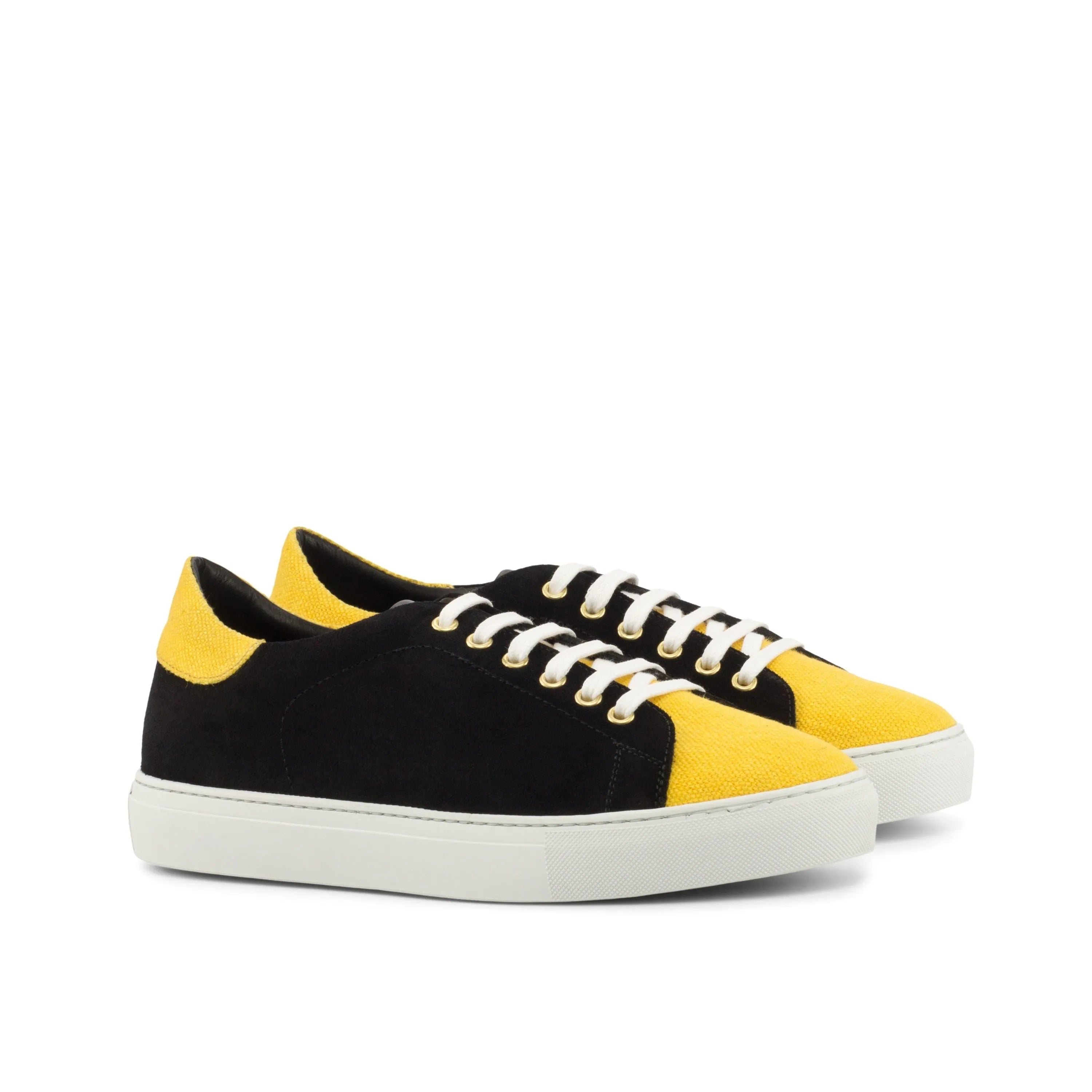 Black and yellow canvas Travis Trainer Sneakers II showcasing trendy trainer sneakers design