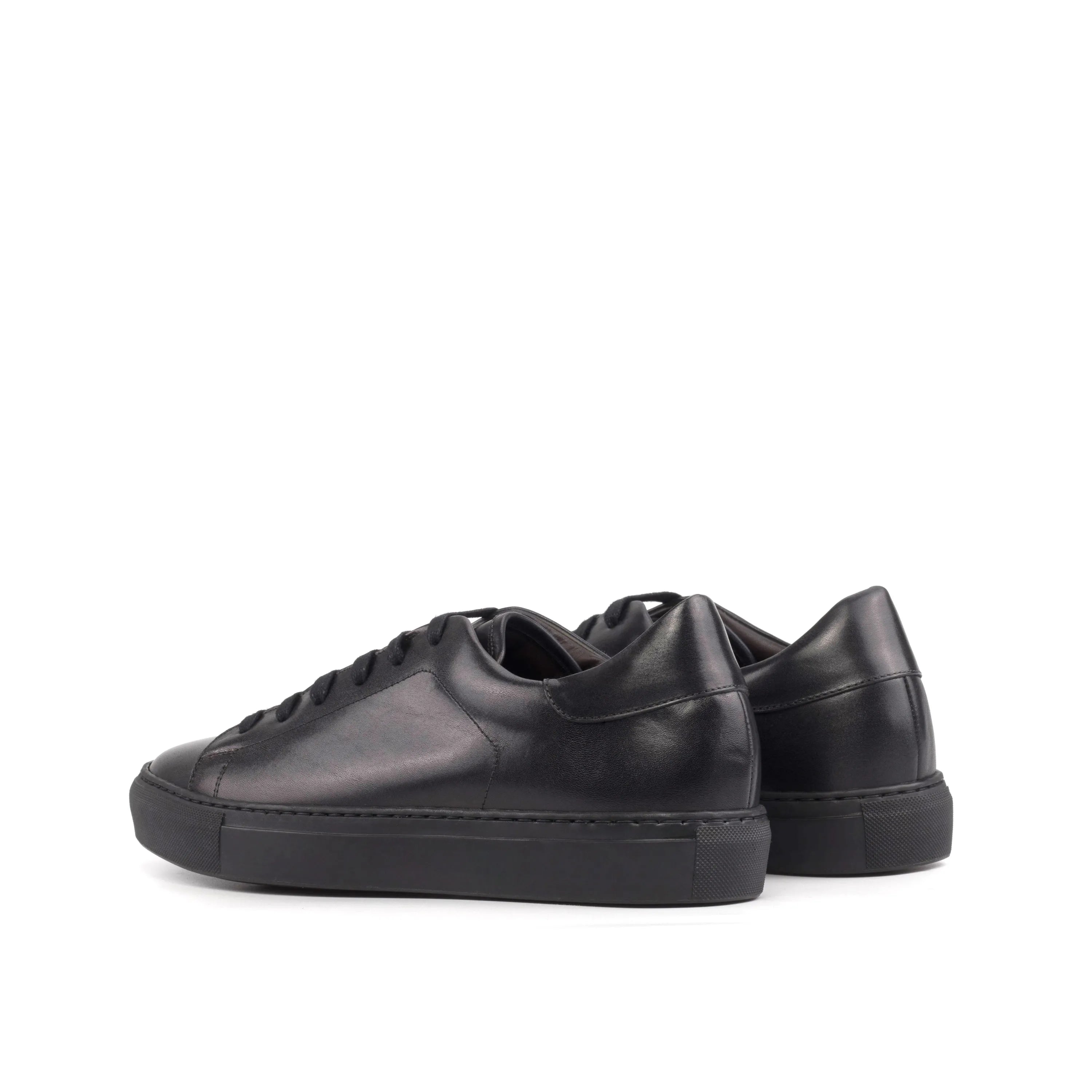 Black leather Tycoon Trainer Sneaker featuring a stylish cupsole design for the fast lane