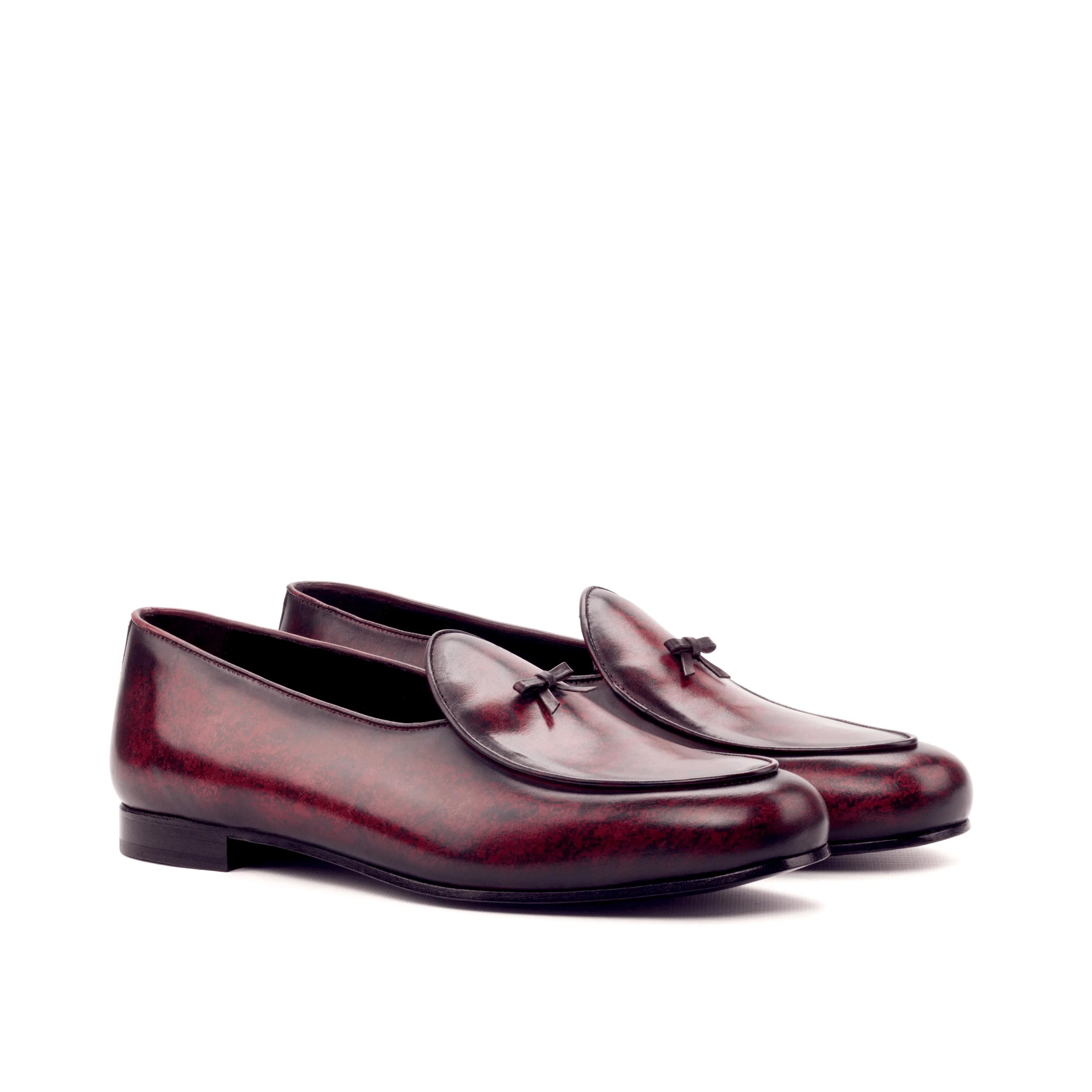 Burgundy leather loafers, showcasing the Vegas Belgian Slipper II with crust patina