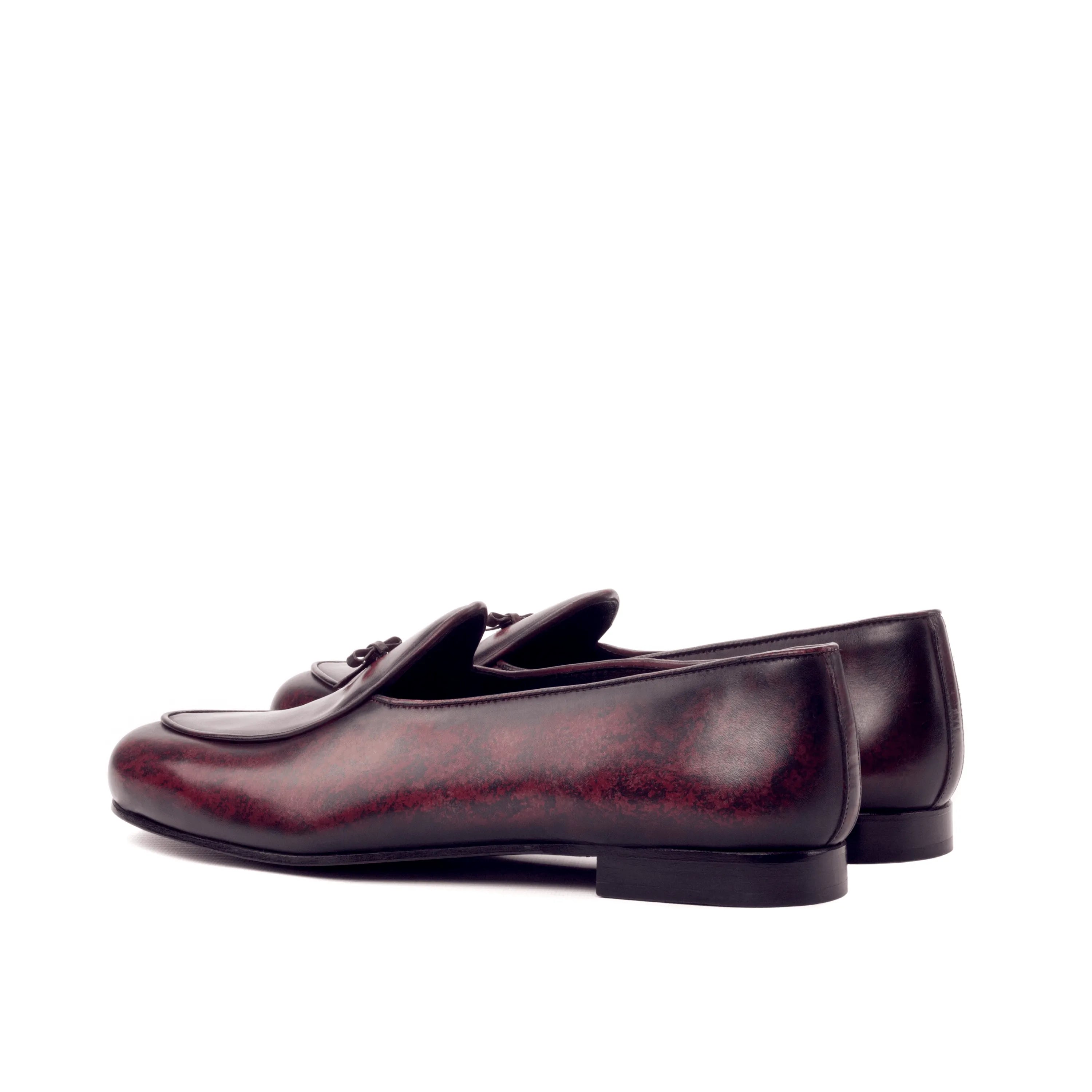 Burgundy leather tassel loafers from the Vegas Belgian Slipper II featuring crust patina