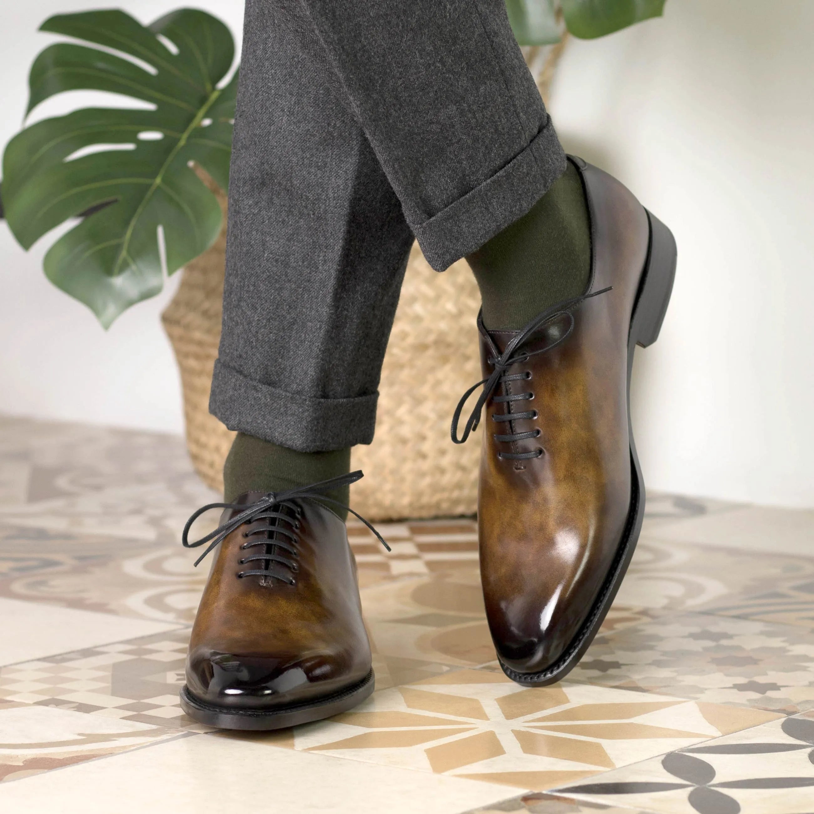 Brown leather Veritas Patina Wholecut shoes showcasing elegant craftsmanship