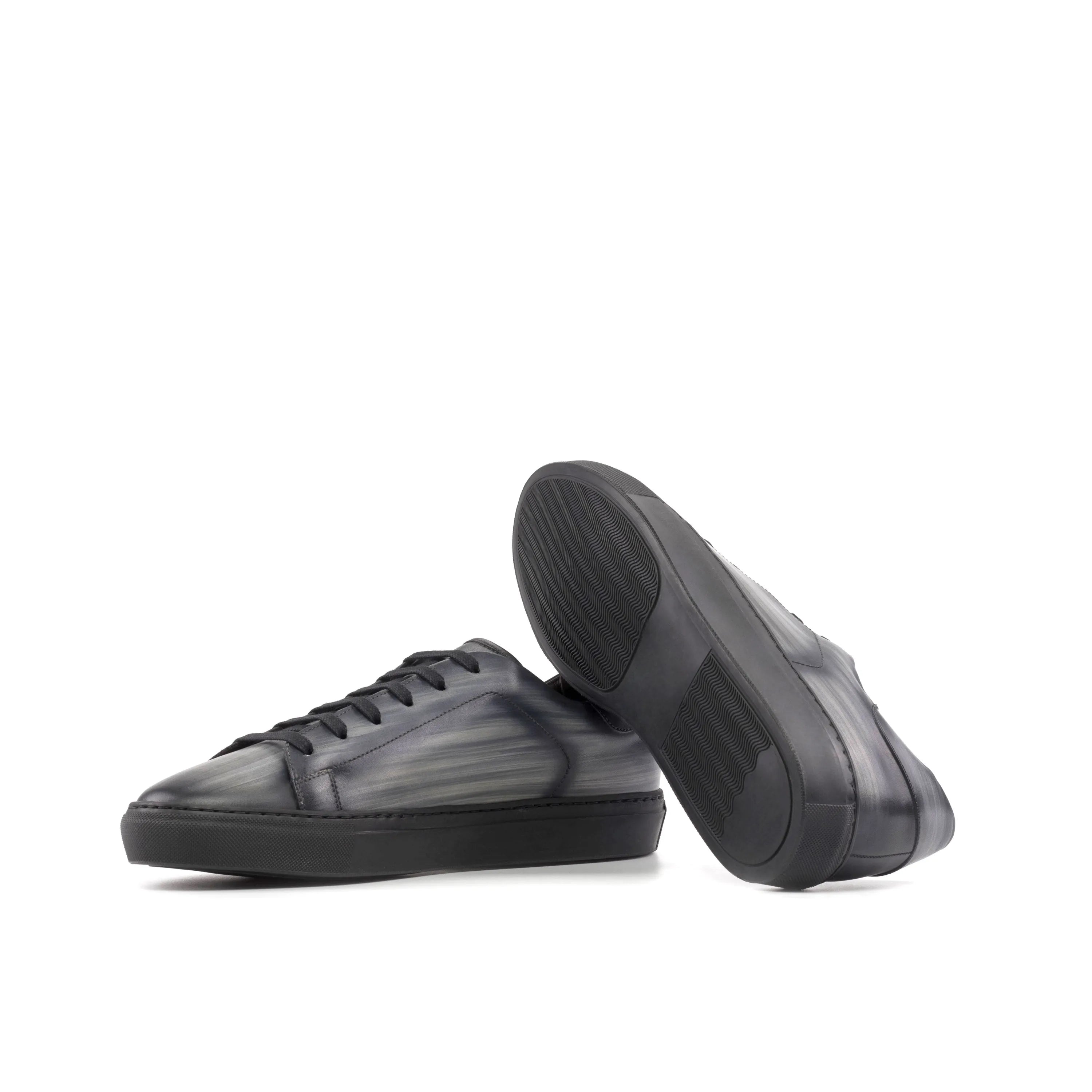 Pair of black leather Verve Trainer Patina sneakers with cupsole design