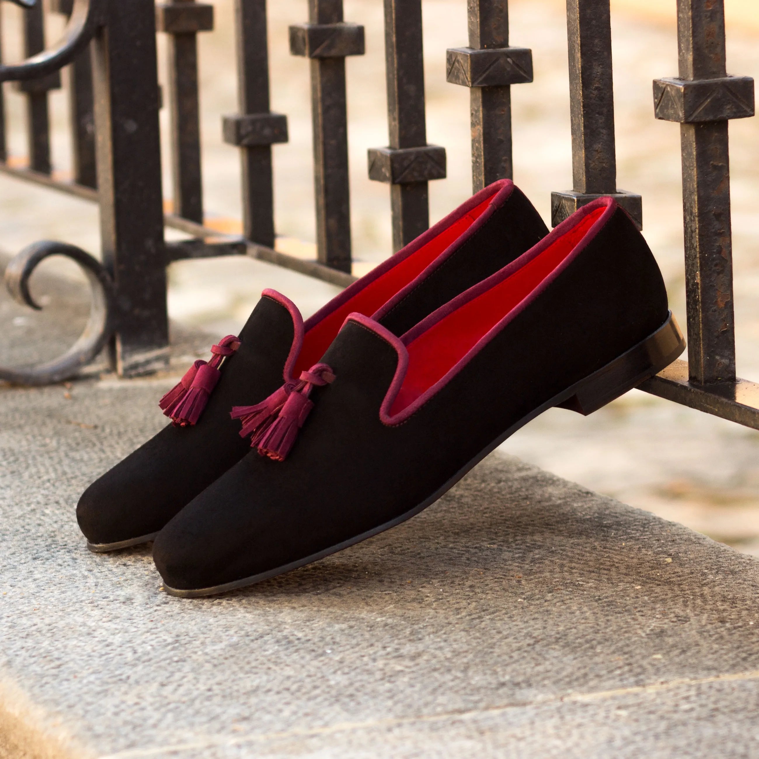 Black velvet loafers with red lining and tassels from the Victor Wellington Slipon collection