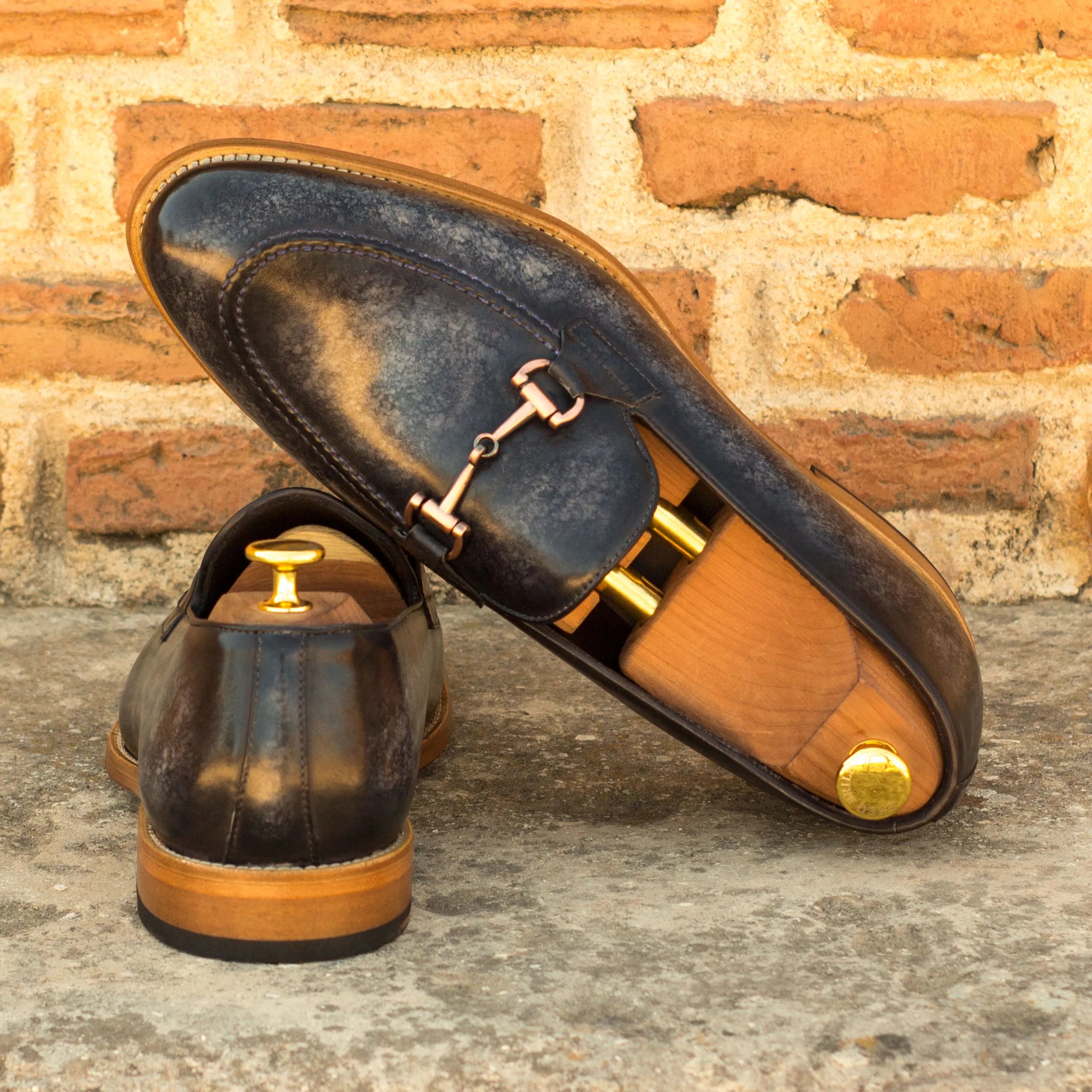 Distressed leather Vosko Patina Loafers featuring a classic horsebit design