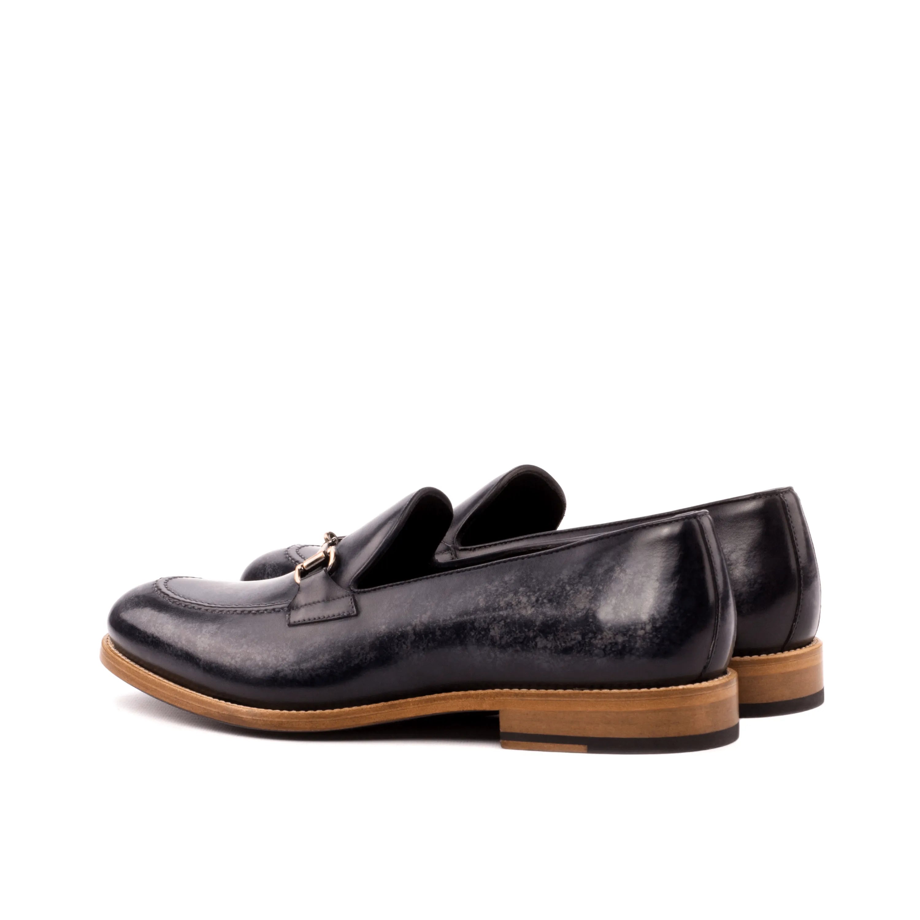 Pair of black leather Vosko Patina Loafers showcasing elegant design and quality craftsmanship