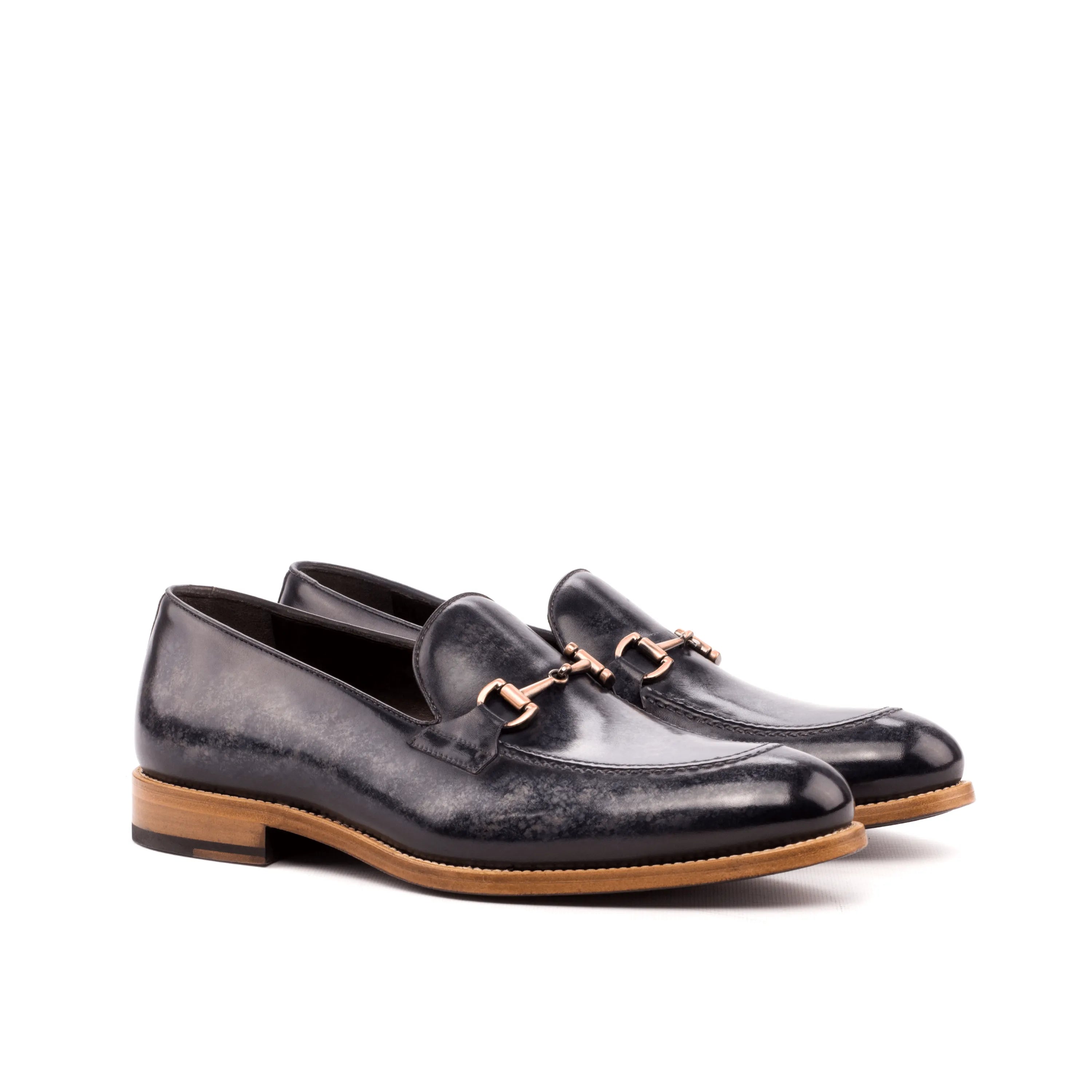 Pair of Vosko Patina Loafers in black leather featuring elegant gold hardware