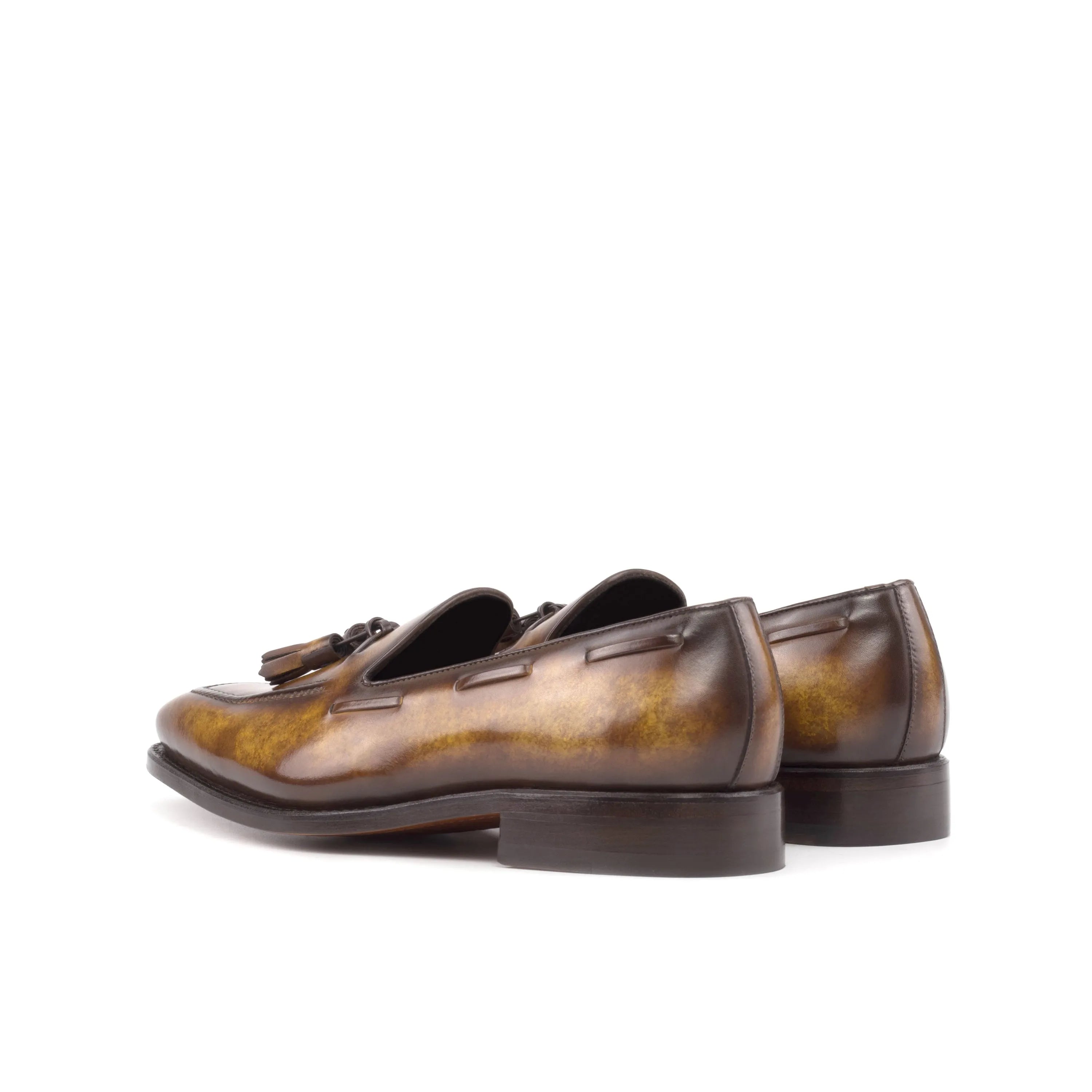 Brown leather tassel loafers from Vuala Patina Loafers showcasing elegant craftsmanship