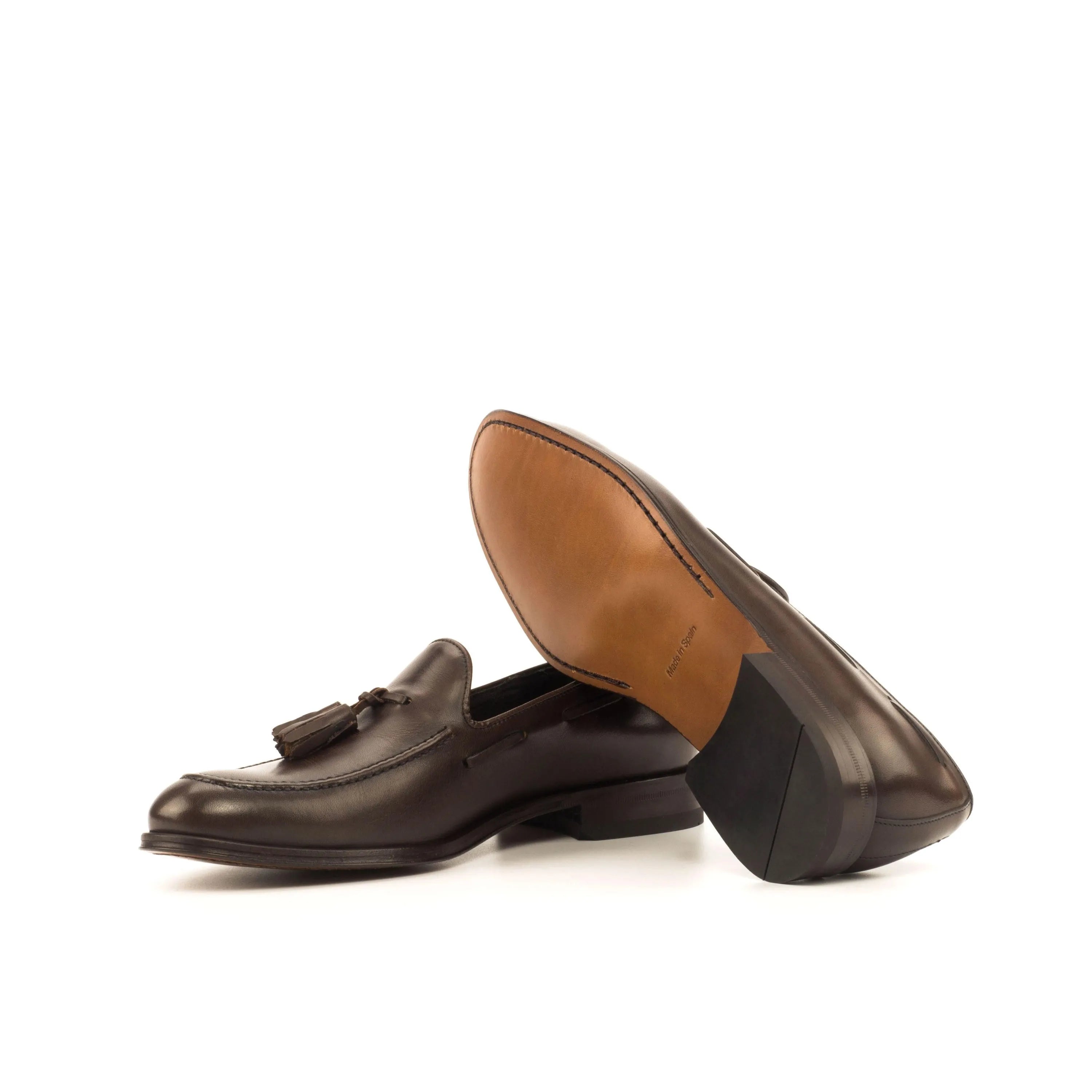 Brown leather tassel loafers with rounded toe, featured in Wachiwi Loafers II collection