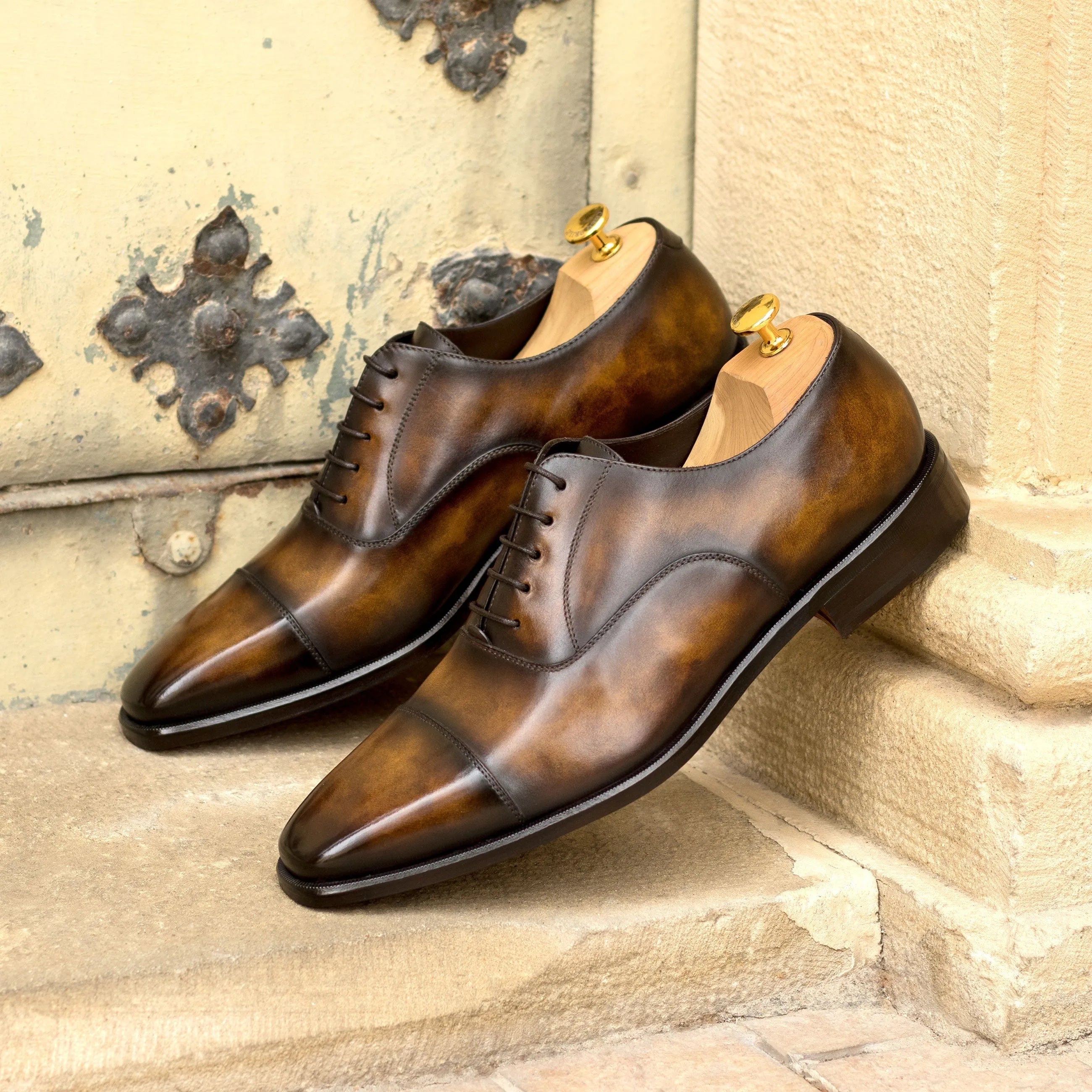 Pair of brown leather Walker Patina Oxford shoes for elegant style and comfort