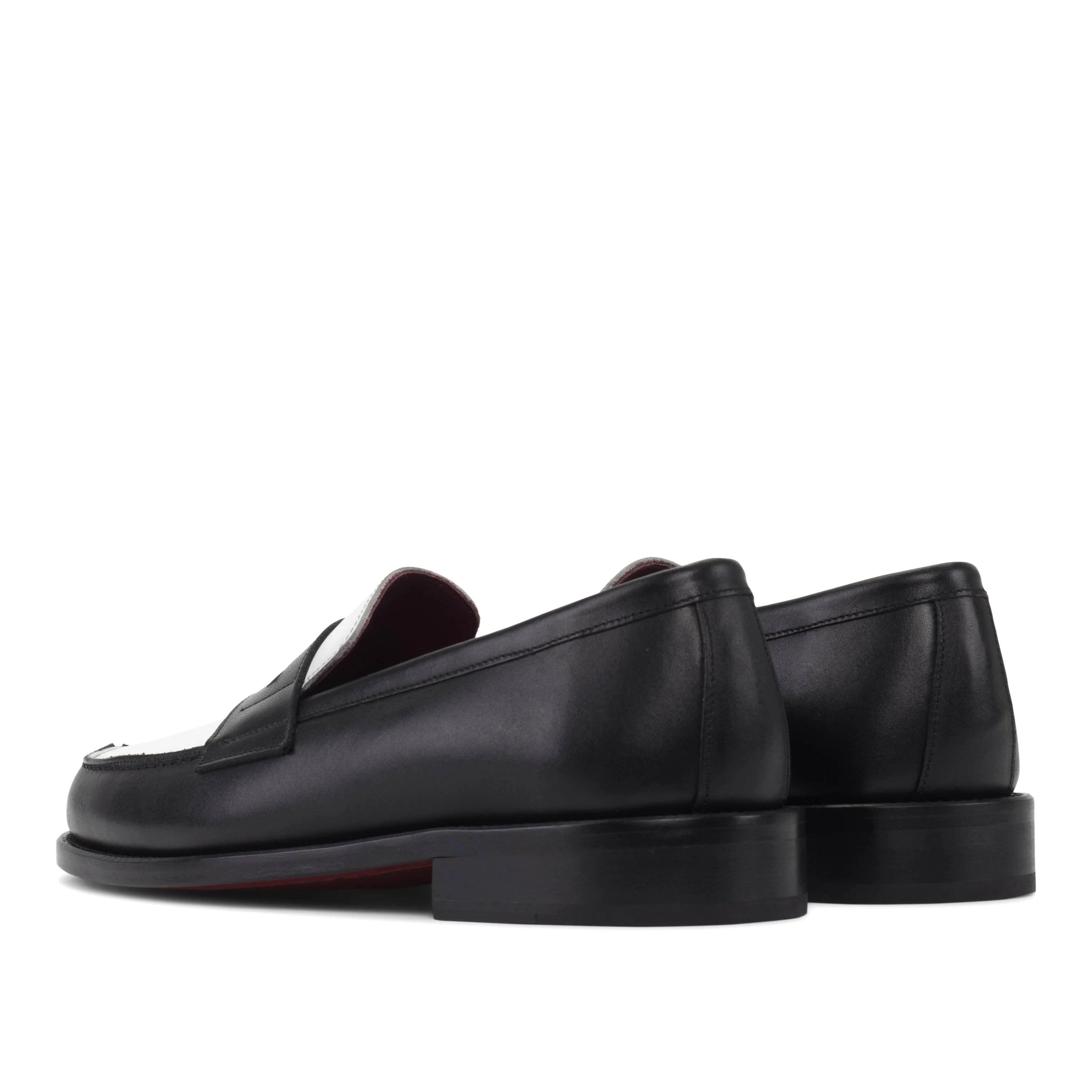 WednesdayOne penny loafers II in black luxe Italian calf leather with white toe cap and red insole