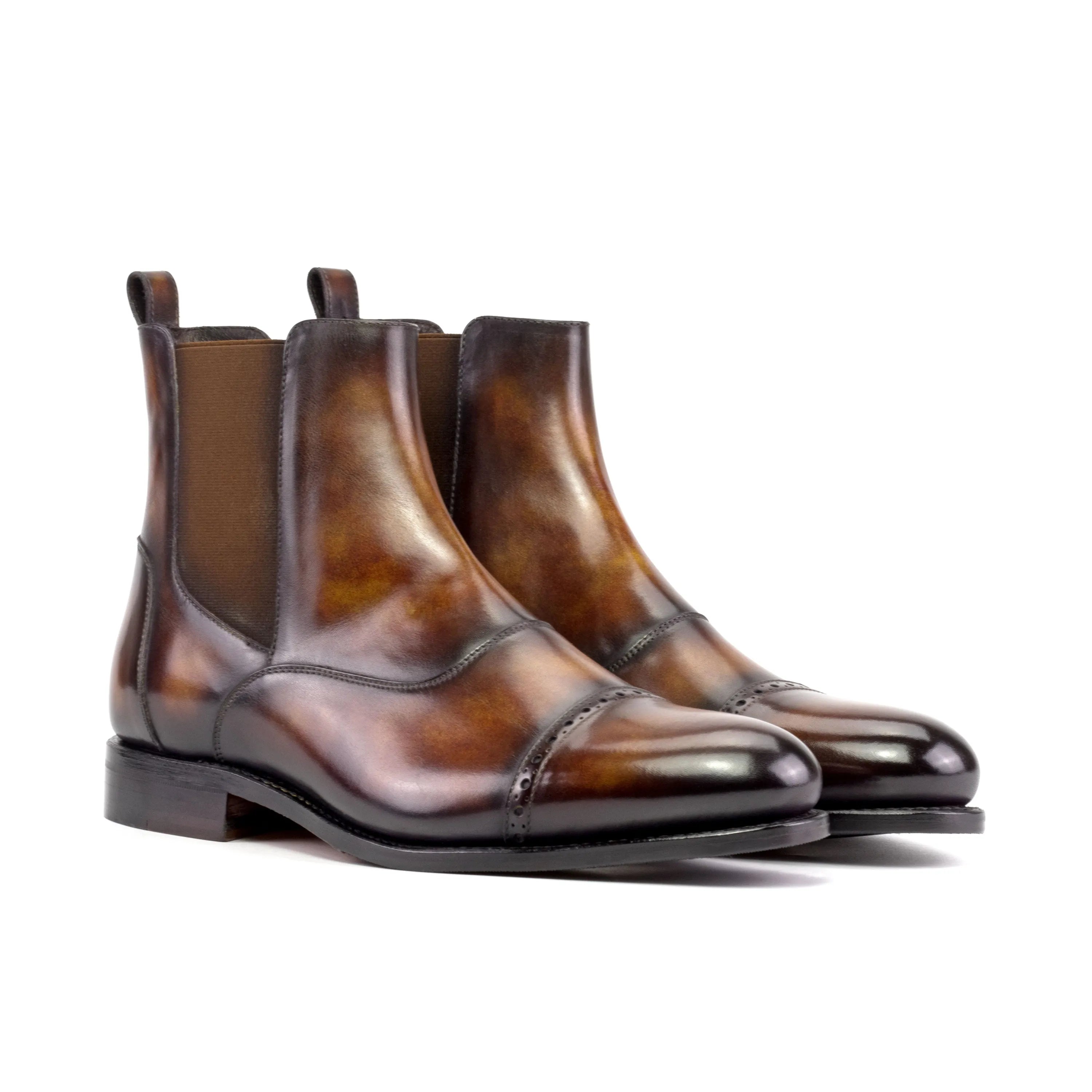 Brown leather Willy Patina Chelsea Boots showcasing elegant style and durable design