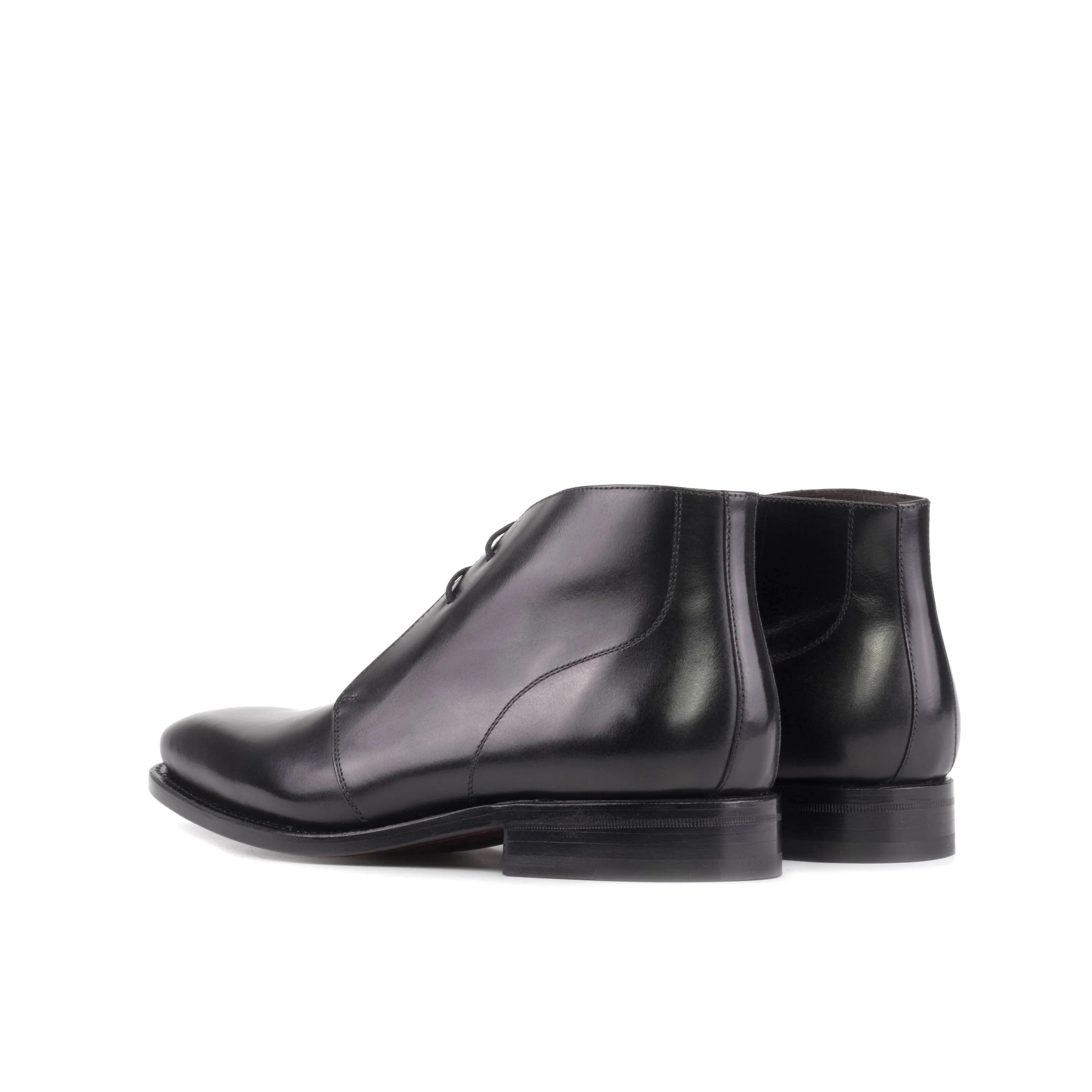Pair of black leather Winsor Chukka boots for a sophisticated look in the fast lane