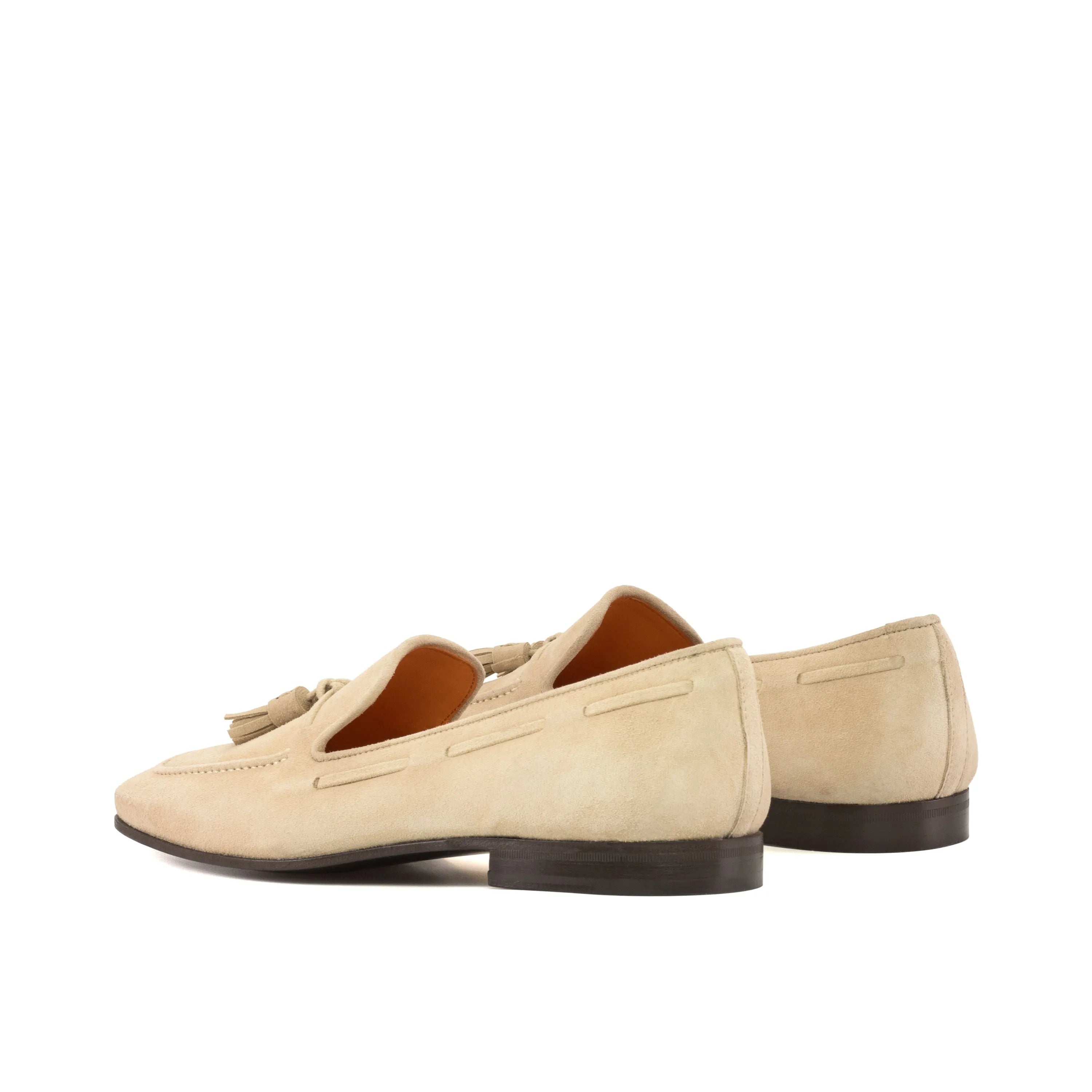 Beige tassel loafers featuring the stylish Xavier Drake Slipon II design