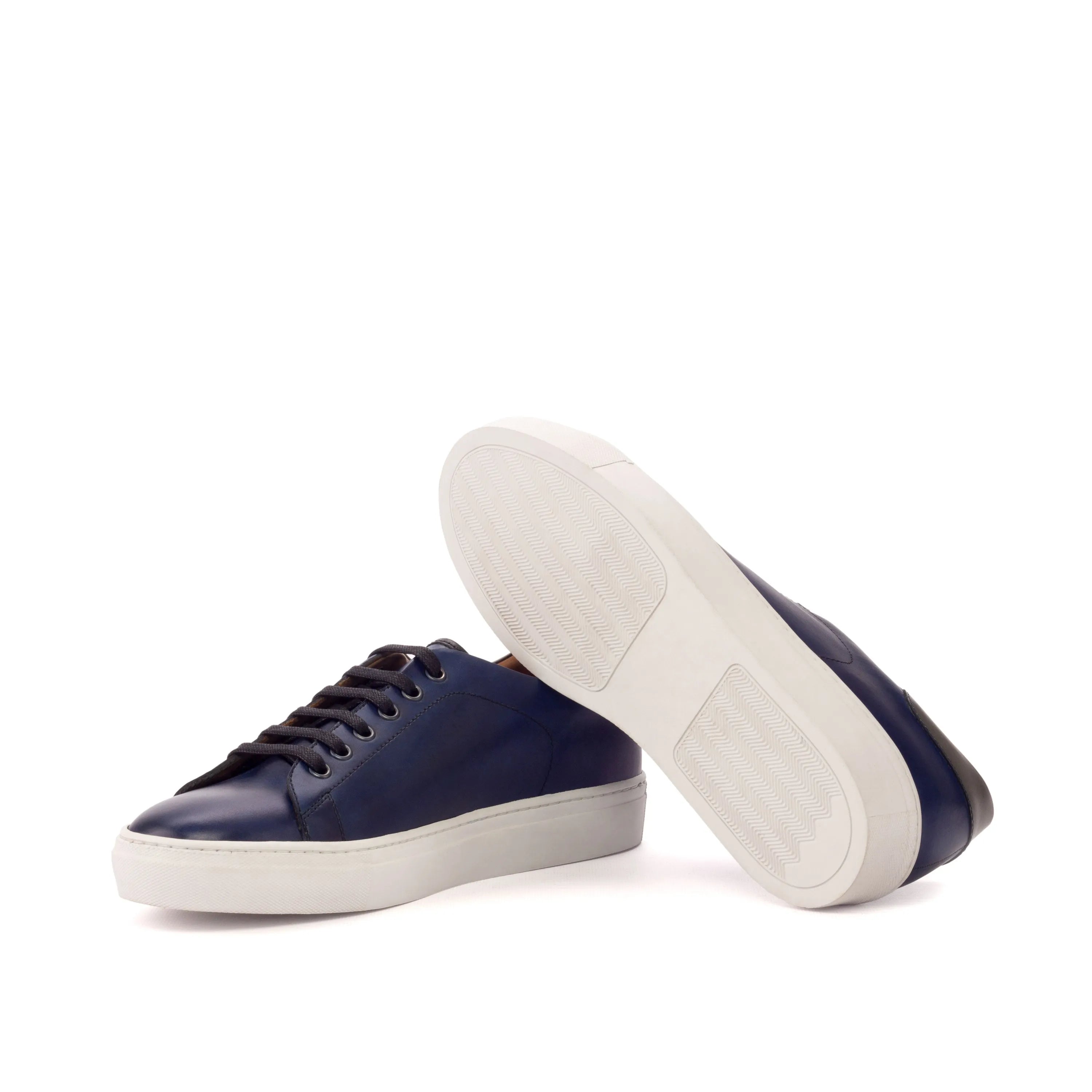 Pair of navy leather Zeloo Trainer Sneakers made from painted calf material