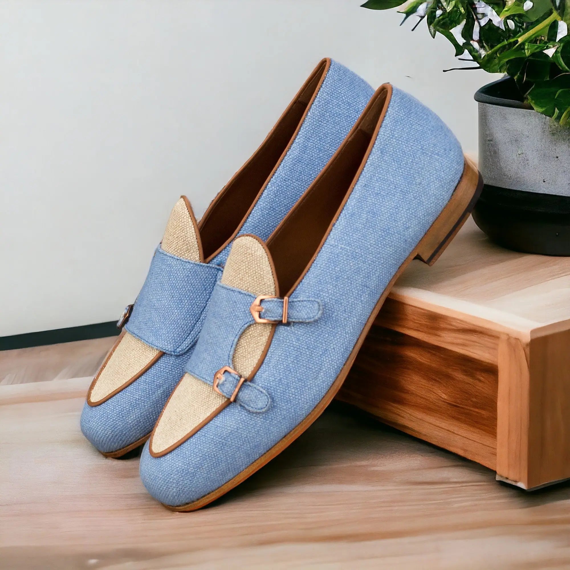 Blue and tan double monk strap shoes.