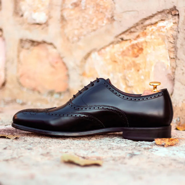 Black leather wingtip dress shoe from 1631 Full Brogue Shoes for elegant style