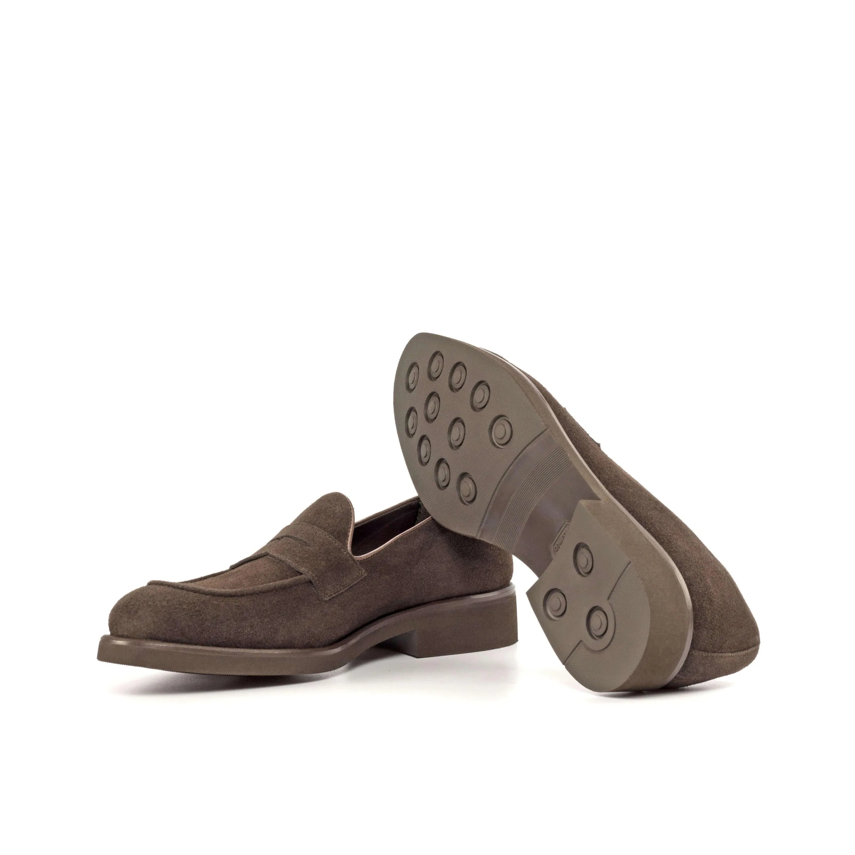 Brown suede penny loafers featured in the 1955 Loafers product line