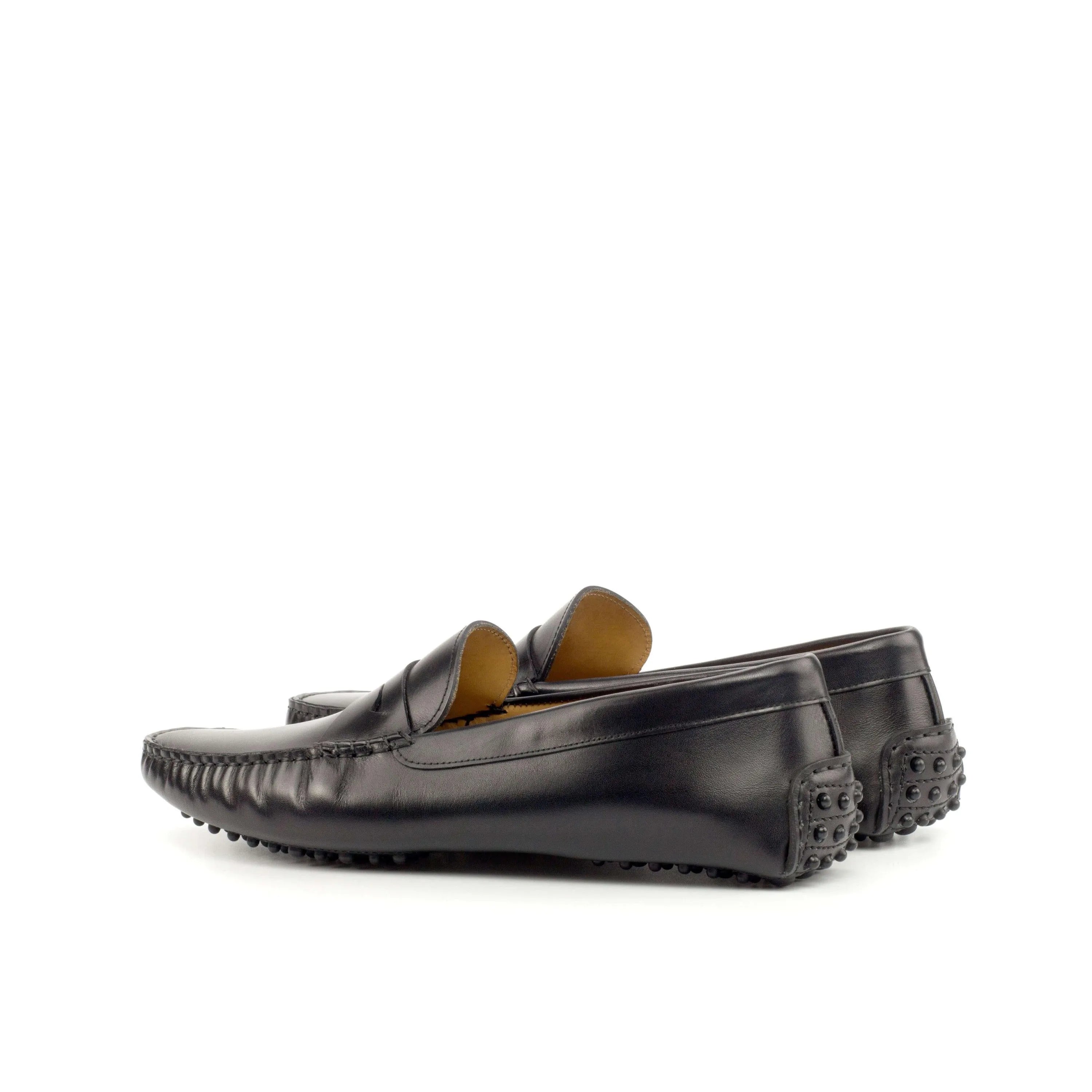 Black leather driving loafers from the 1963 Driver collection with rubber sole