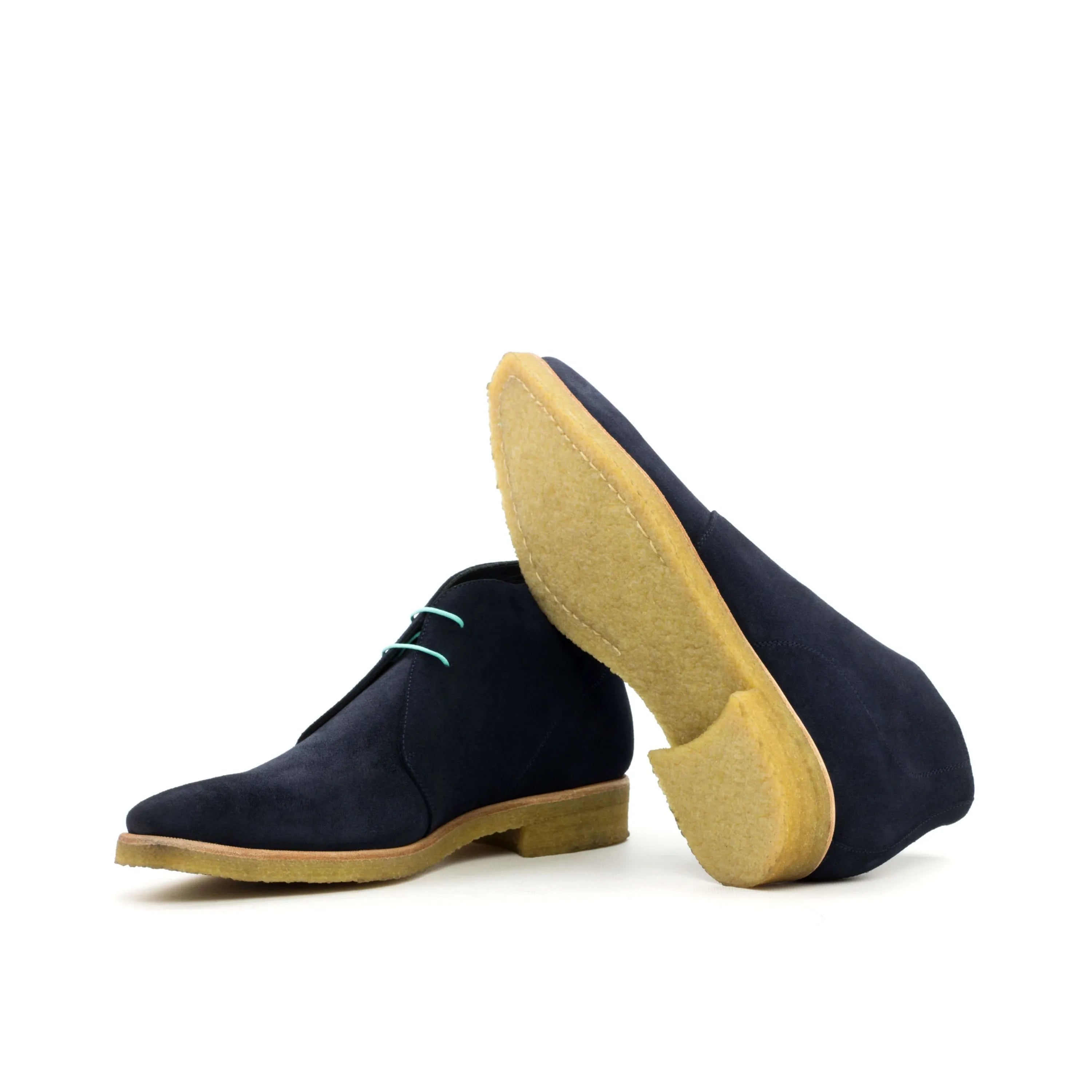 Blue suede Adamo Chukka boots displayed elegantly for stylish footwear enthusiasts