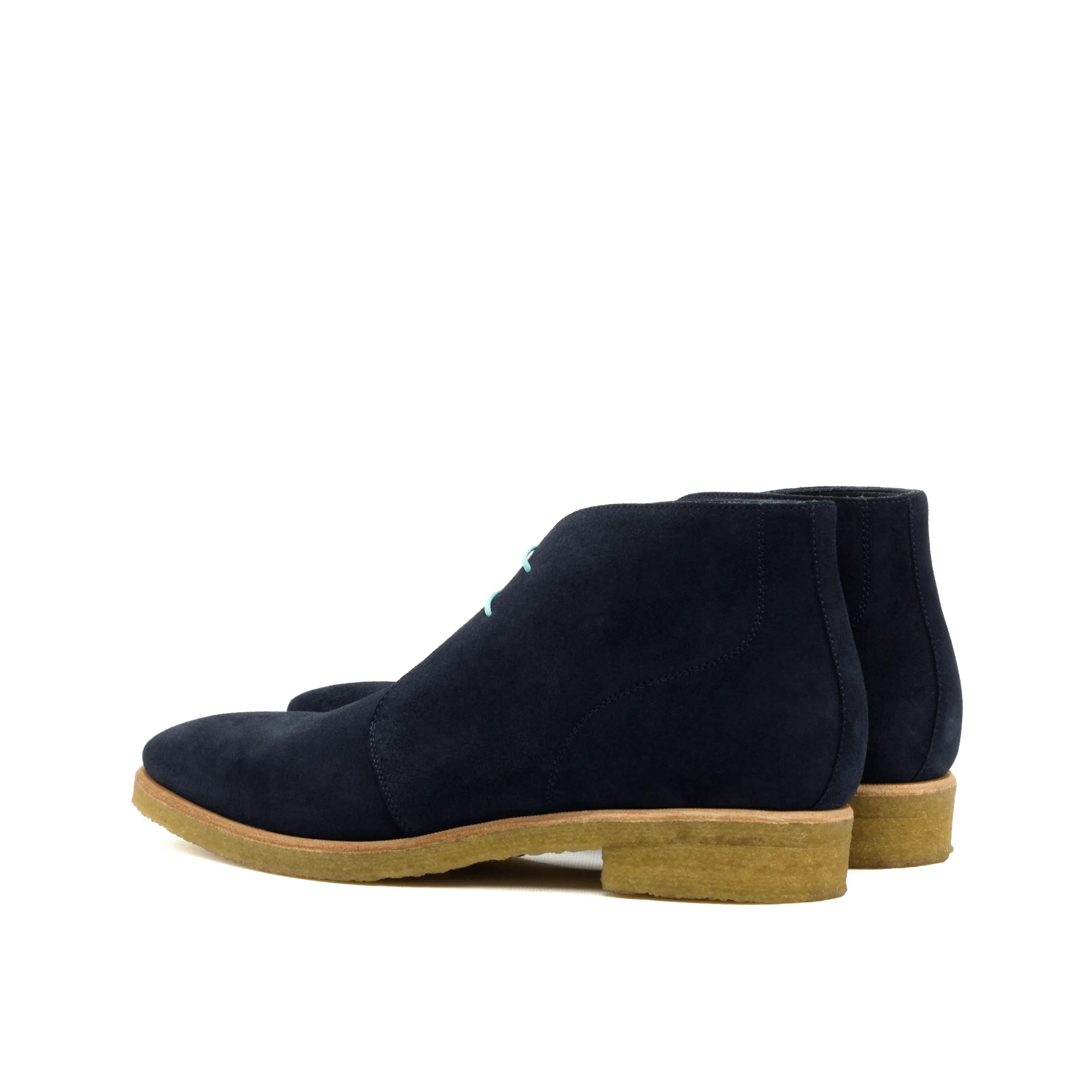 Dark blue suede Adamo Chukka boots showcasing stylish and versatile chukka boots design