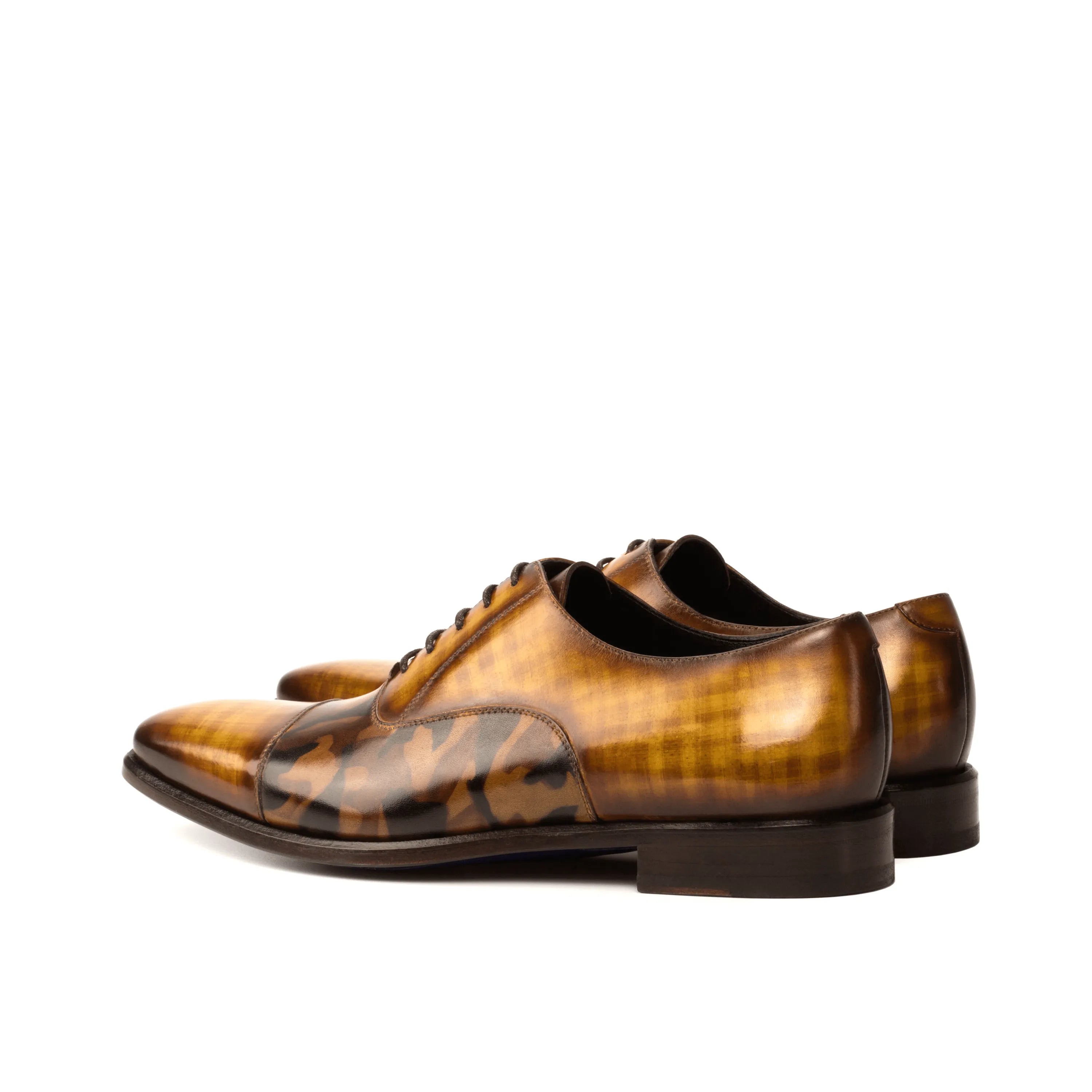 Brown leather Agent Oxford Patina shoes showcasing elegant style and craftsmanship