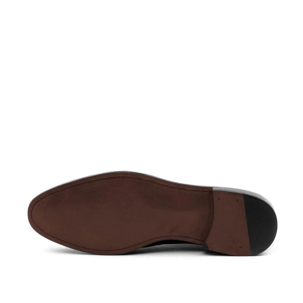 Brown shoe sole of Amarelo Patina Loafers showcasing elegant design and durability