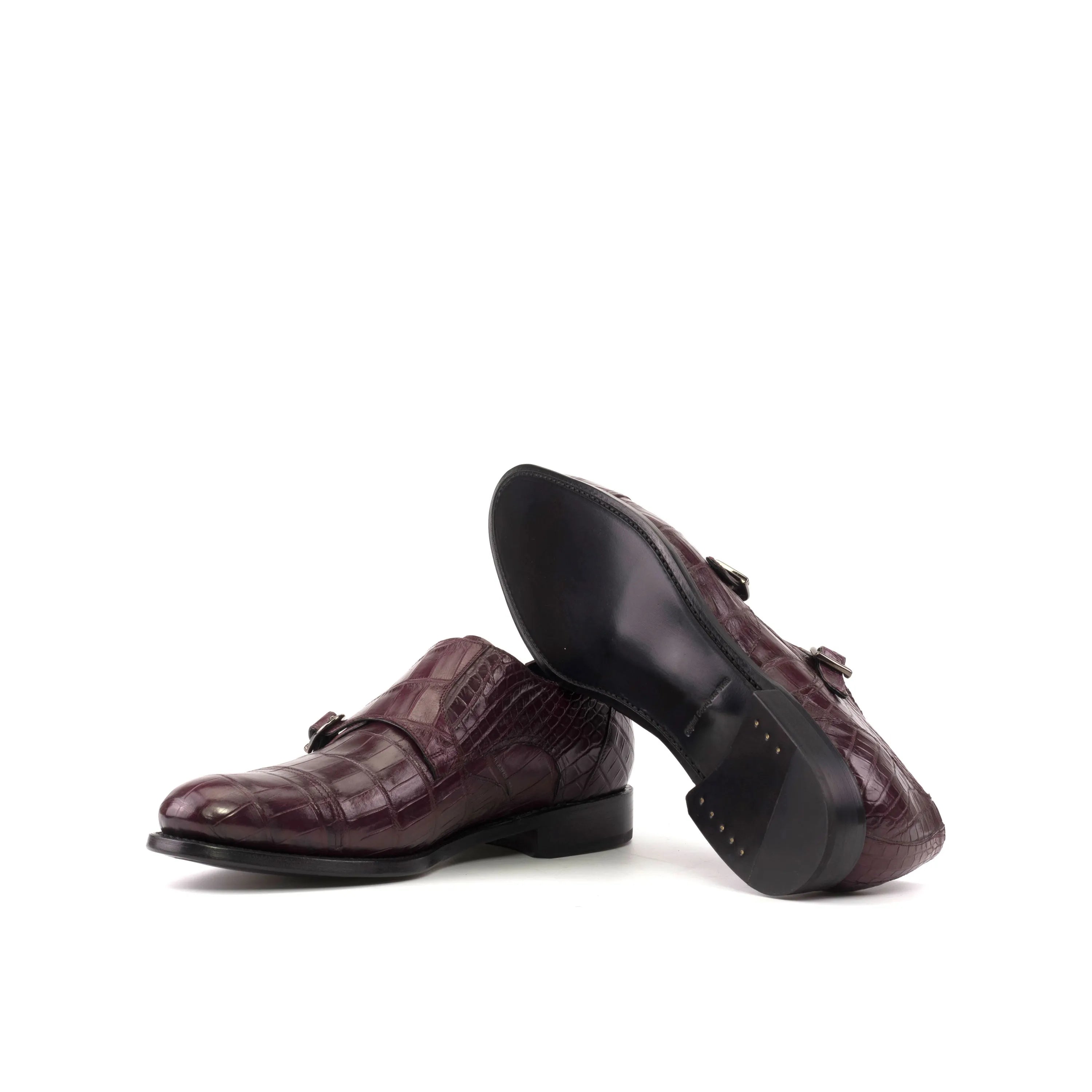 Burgundy crocodile-patterned monk strap shoes from Amiri Alligator Double Monk II