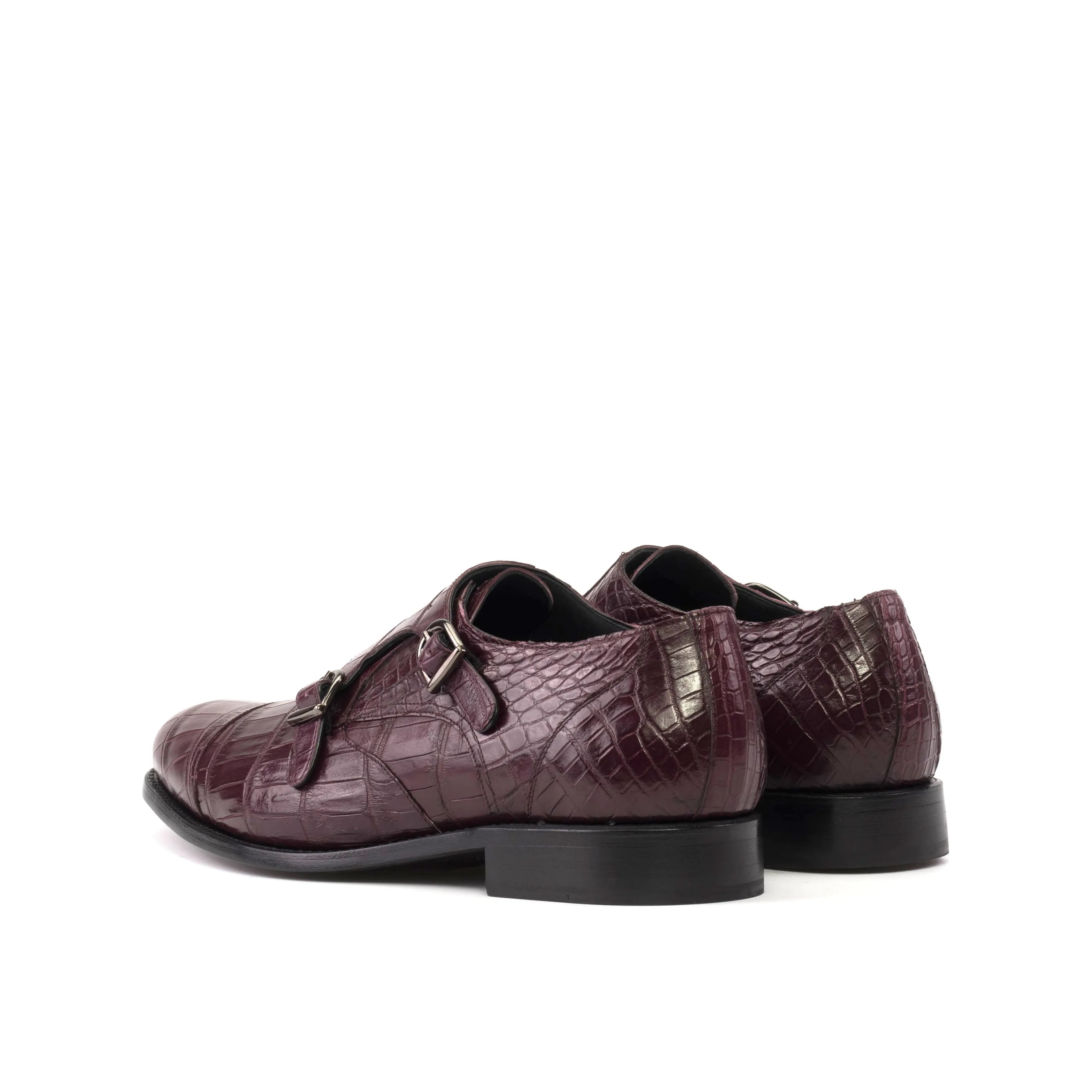 Burgundy crocodile-patterned monk strap shoes from Amiri Alligator Double collection