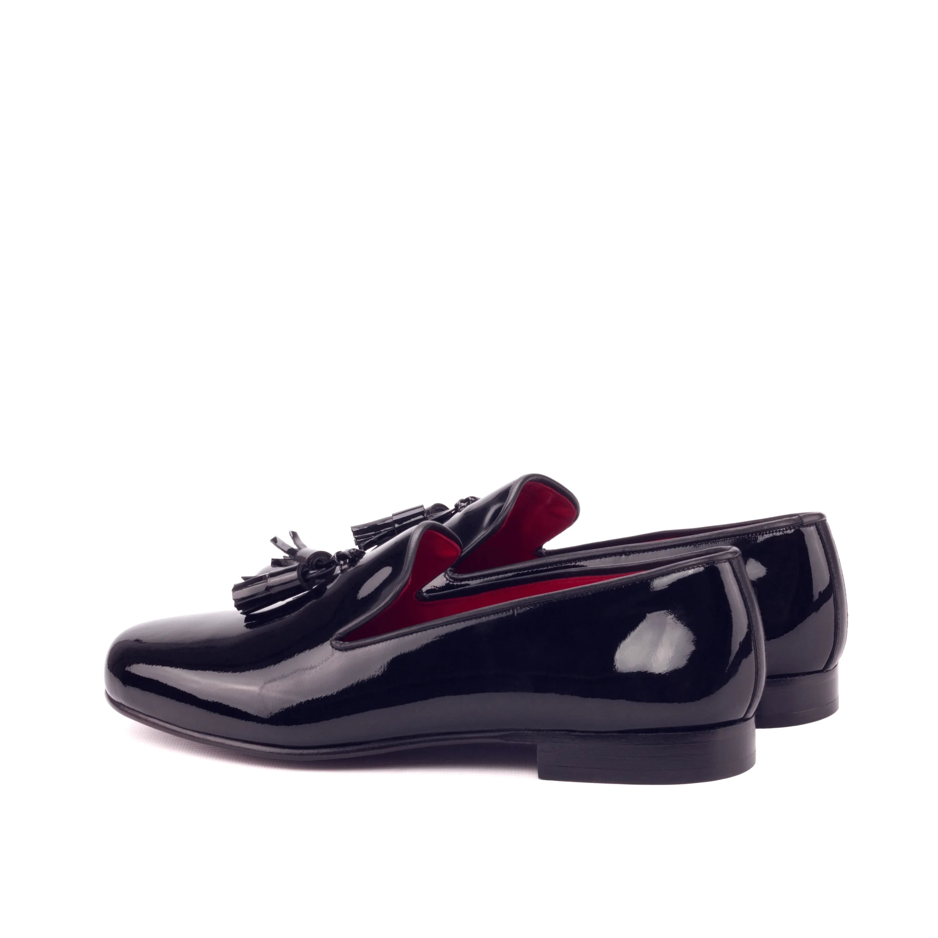 Pair of shiny black tassel loafers from Amuso Wellington slip collection