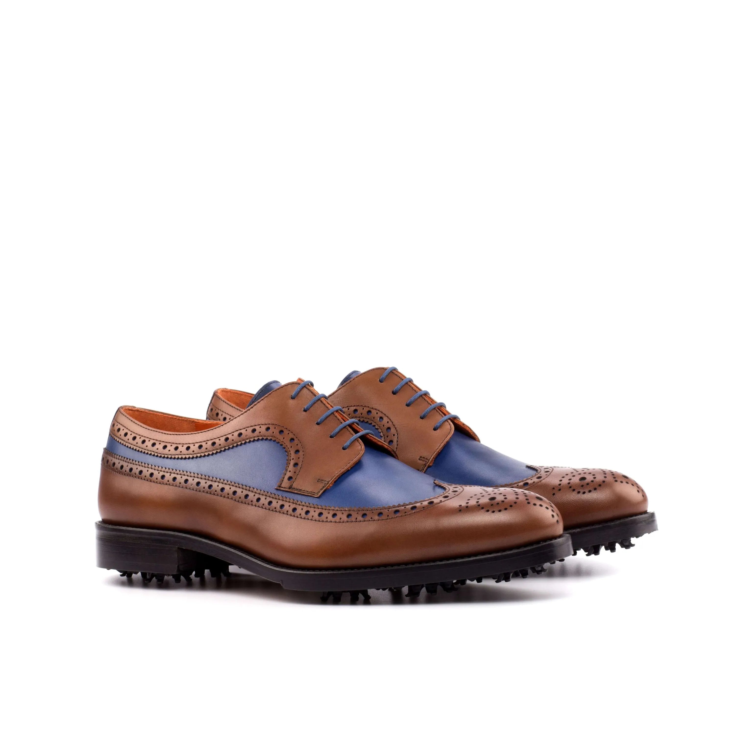 Two-toned leather Andy Longwing Blucher golf shoes showcasing long wingtip design