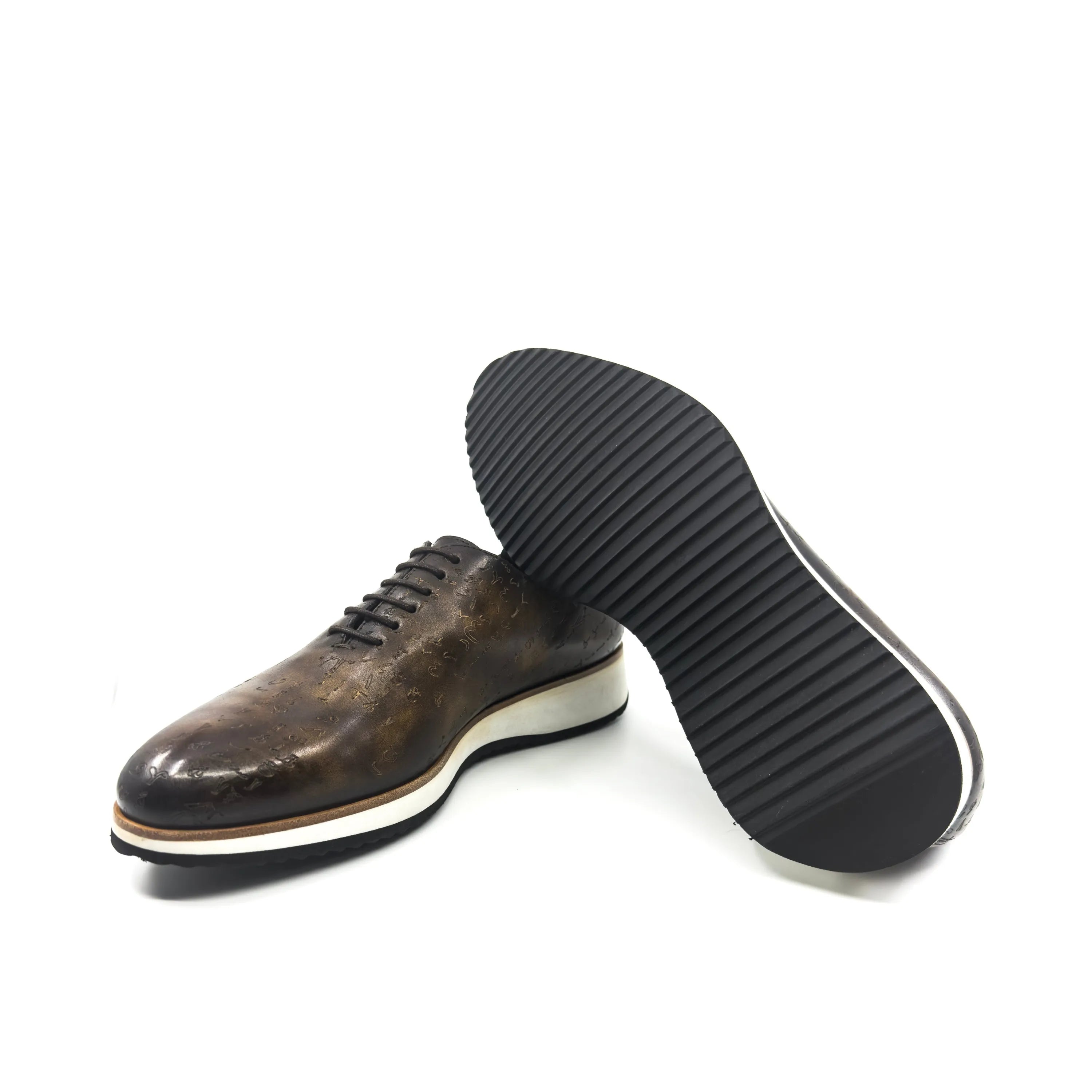 Brown leather dress shoe with thick black sole, part of Matrix II Patina Wholecut Shoes