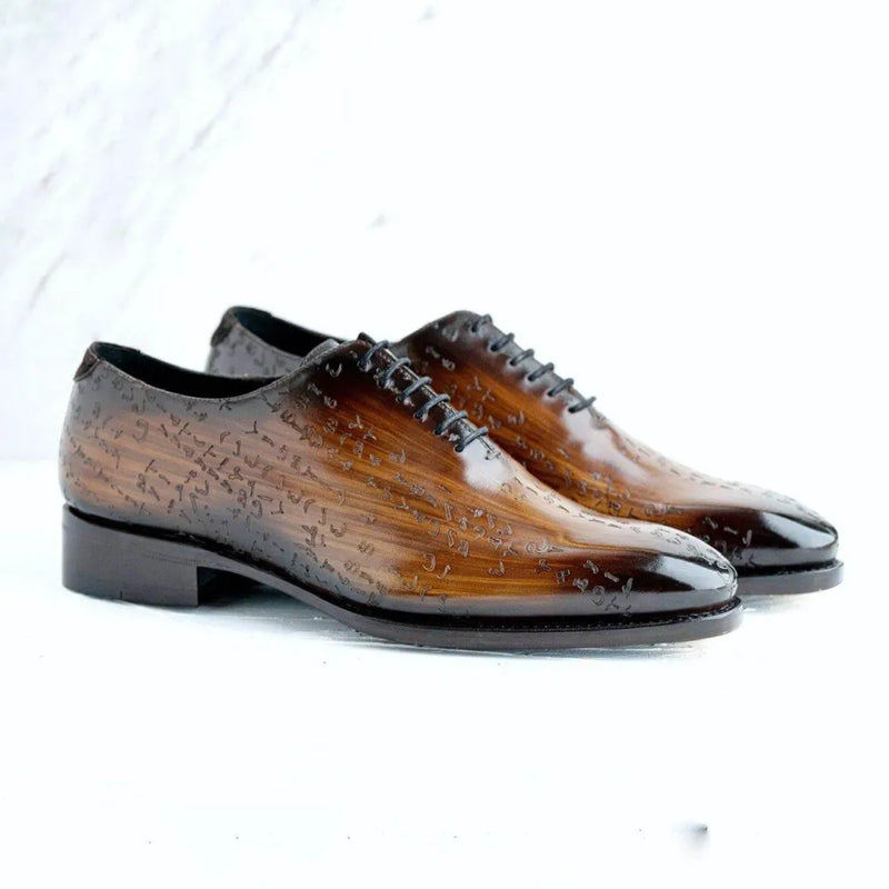 Brown leather dress shoes from the Arabic Matrix Patina Wholecut collection in Italian crust leather