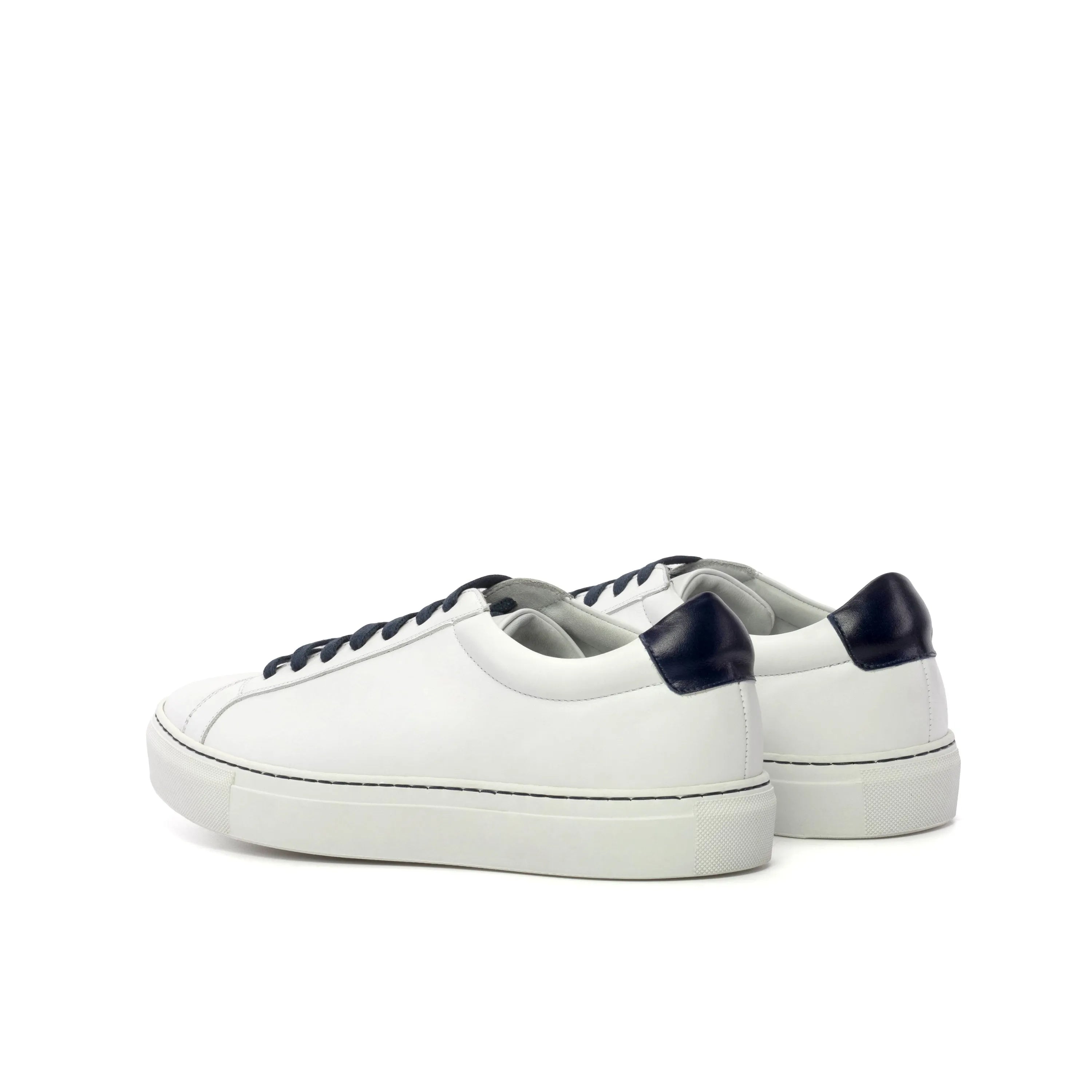 White leather Ardo low kick sneakers with navy accents for a stylish fast lane look