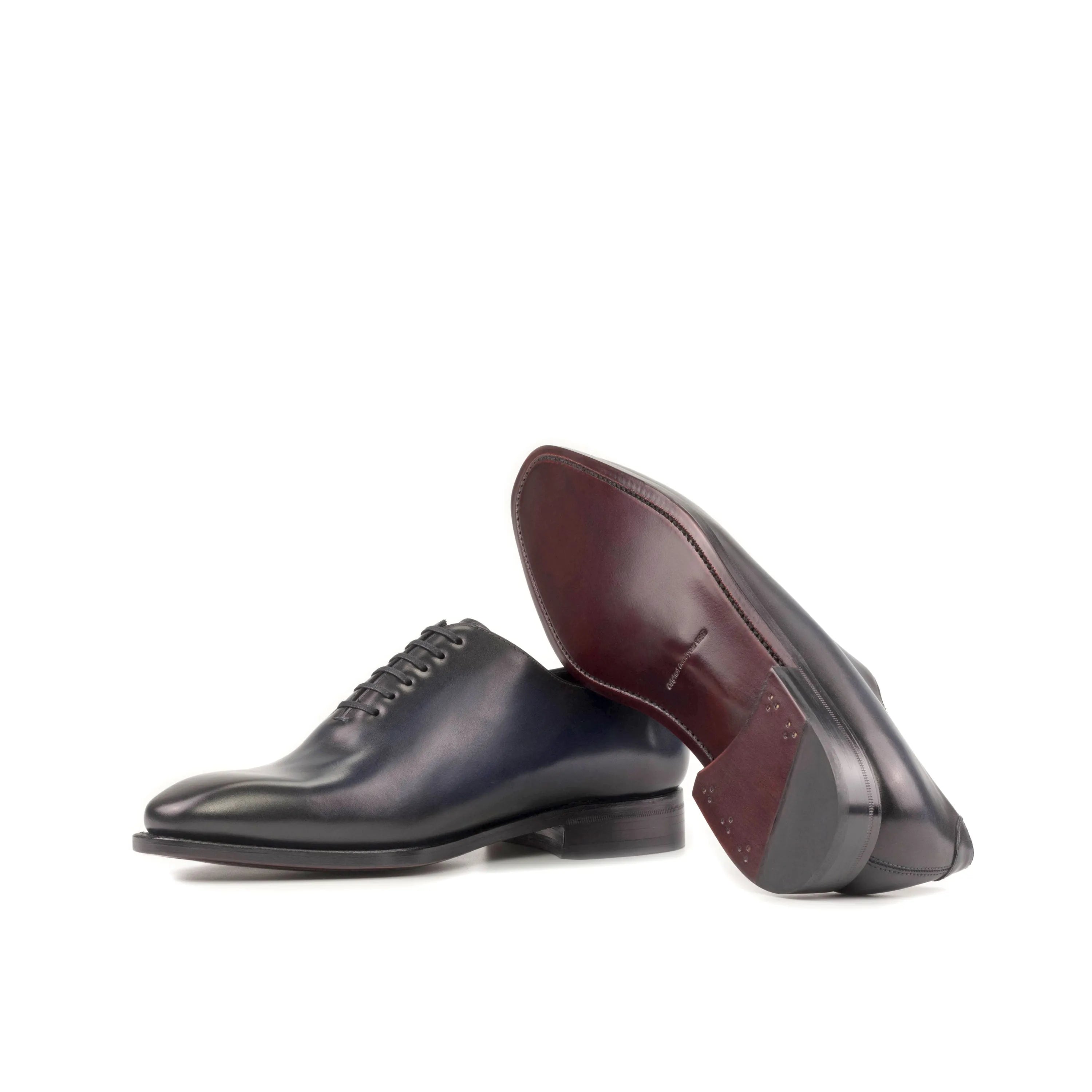 Pair of Baron Wholecut shoes, showcasing elegant leather craftsmanship and design