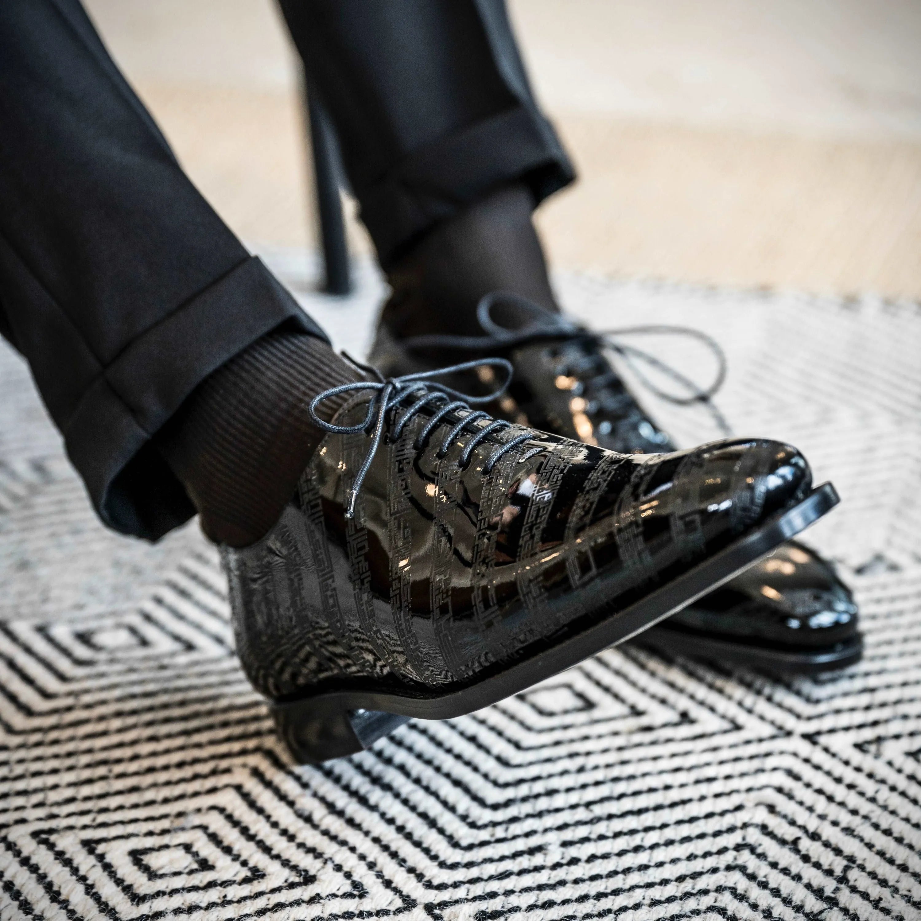 Shiny black patent leather dress shoes from the Before The Throne Wholecut collection